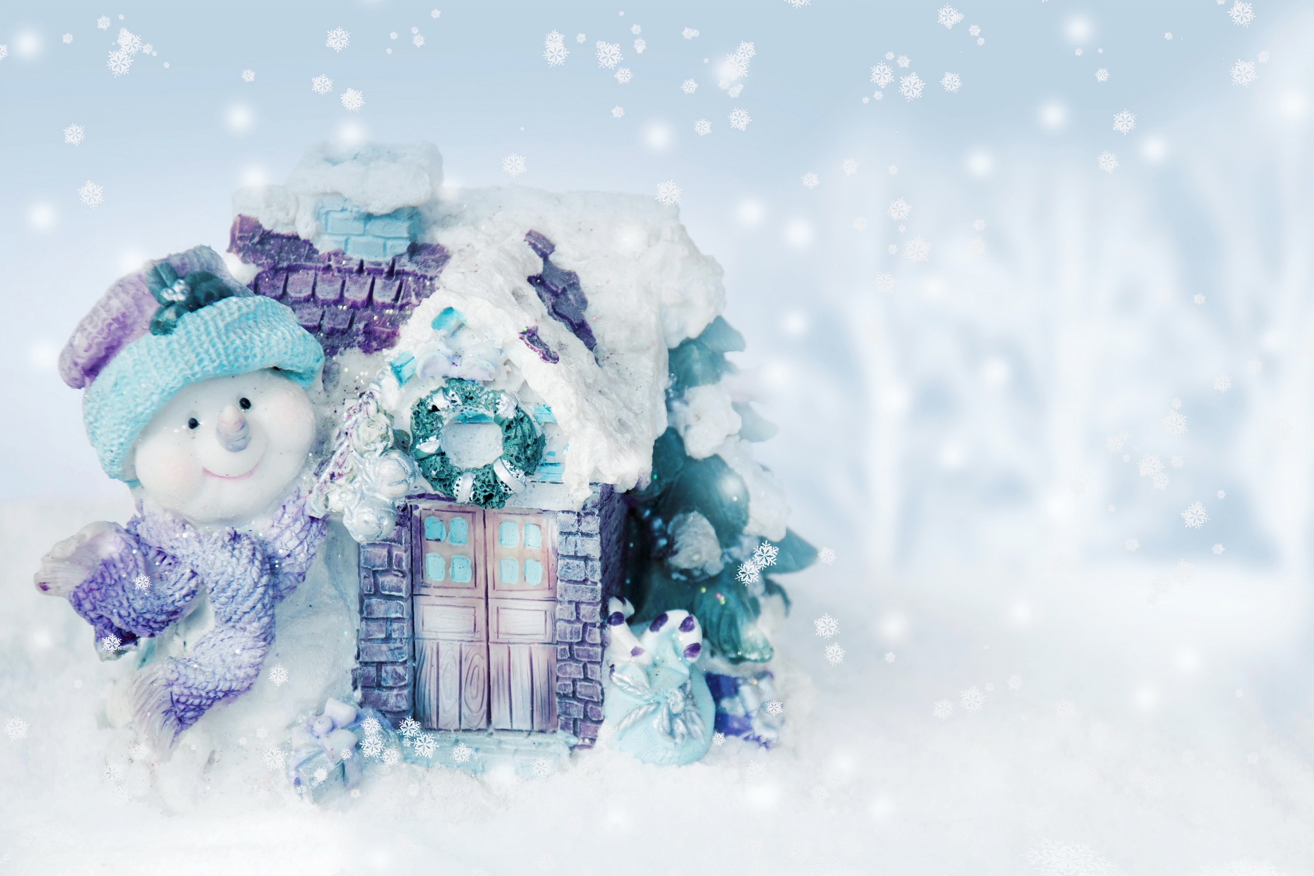 Snowman and Christmas house in snow HD Wallpaper