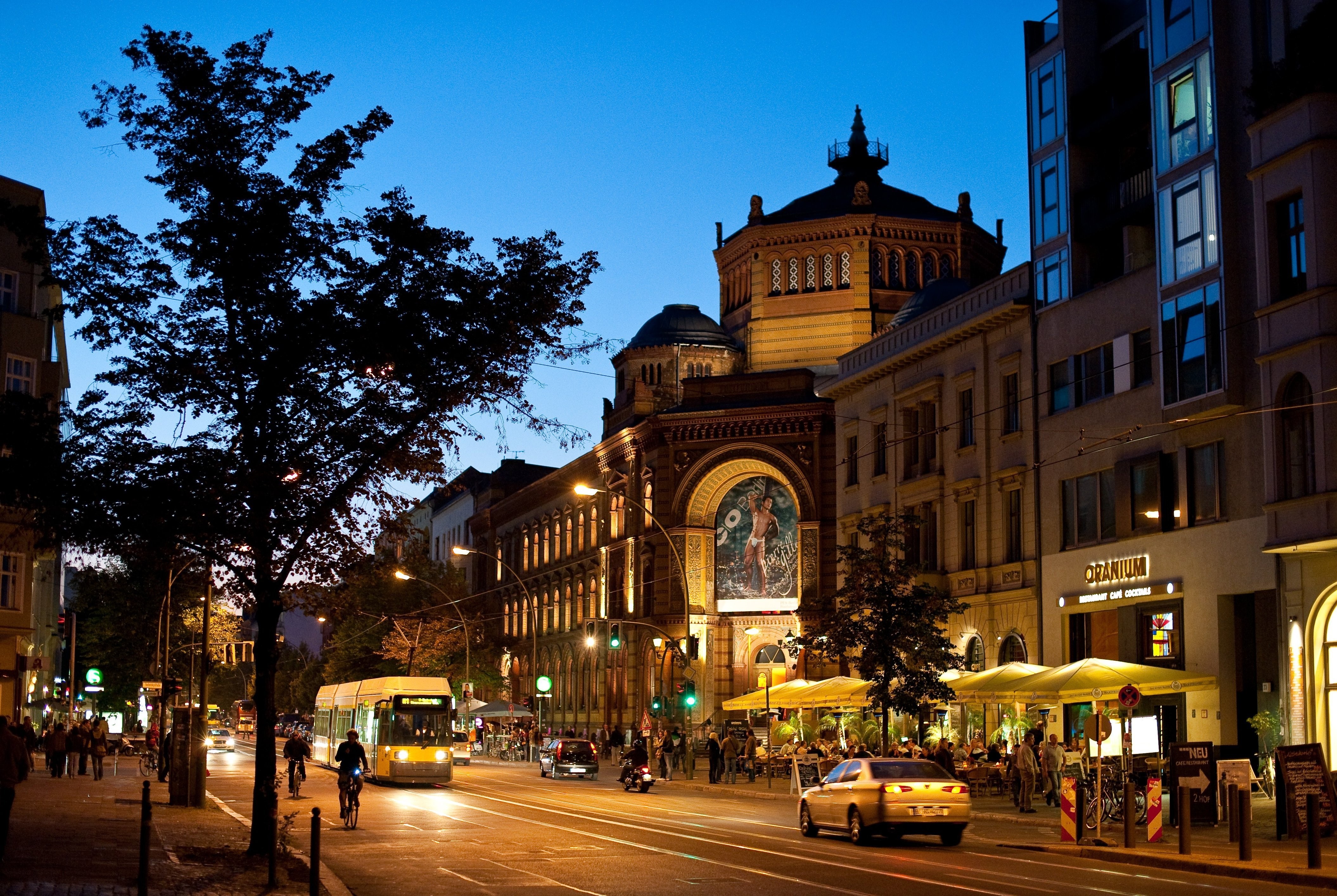 Berlin Street Scene at Night with Tram and Buildings HD Wallpaper