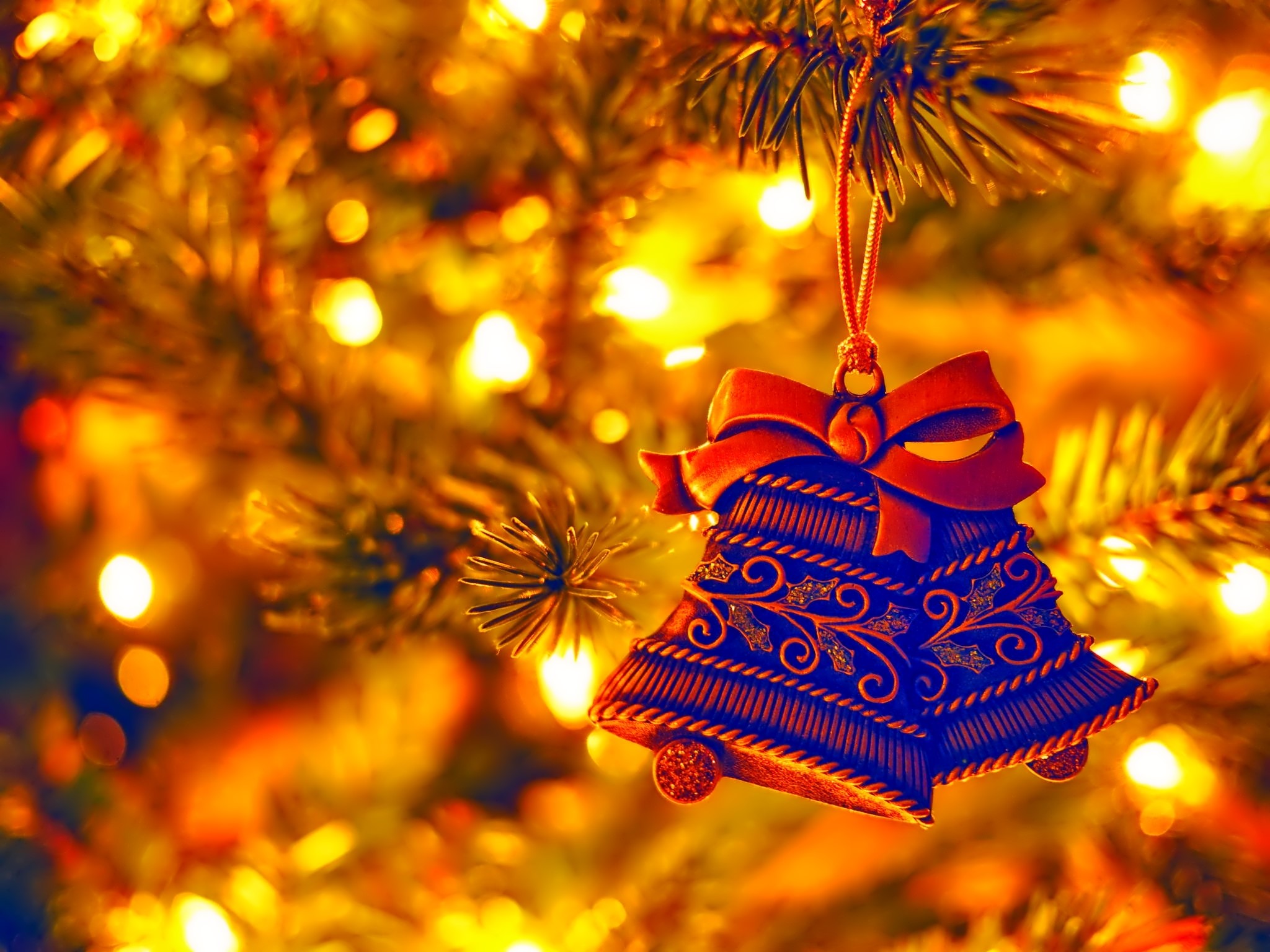 Christmas Bells Ornament on a Tree with Lights HD Wallpaper