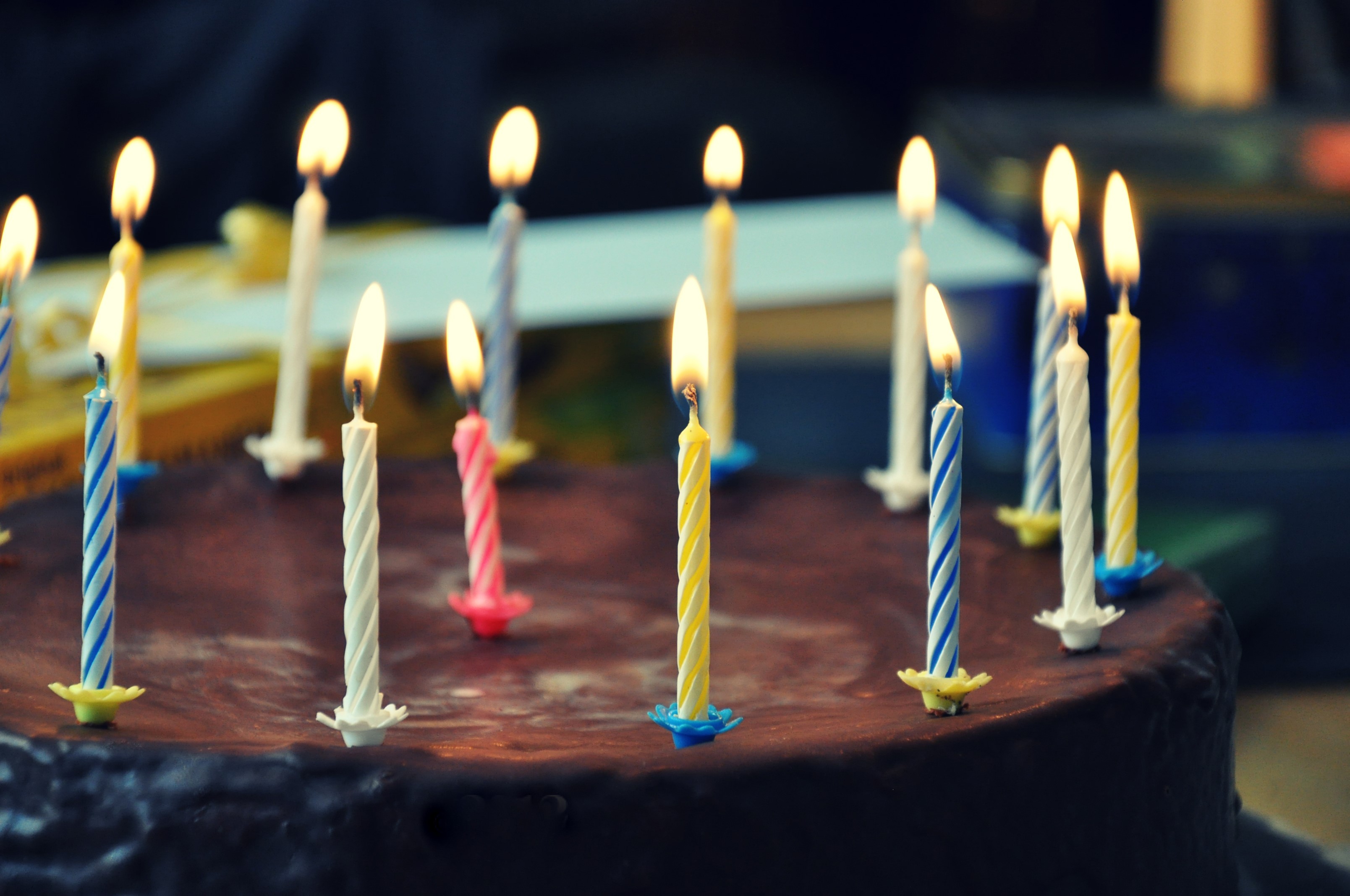Chocolate cake with lit birthday candles HD Wallpaper