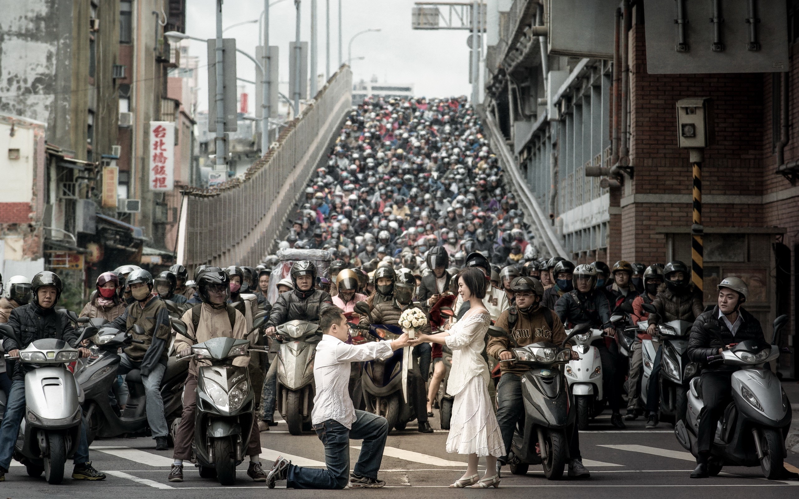 Couple getting engaged in a massive motorcycle traffic jam HD Wallpaper