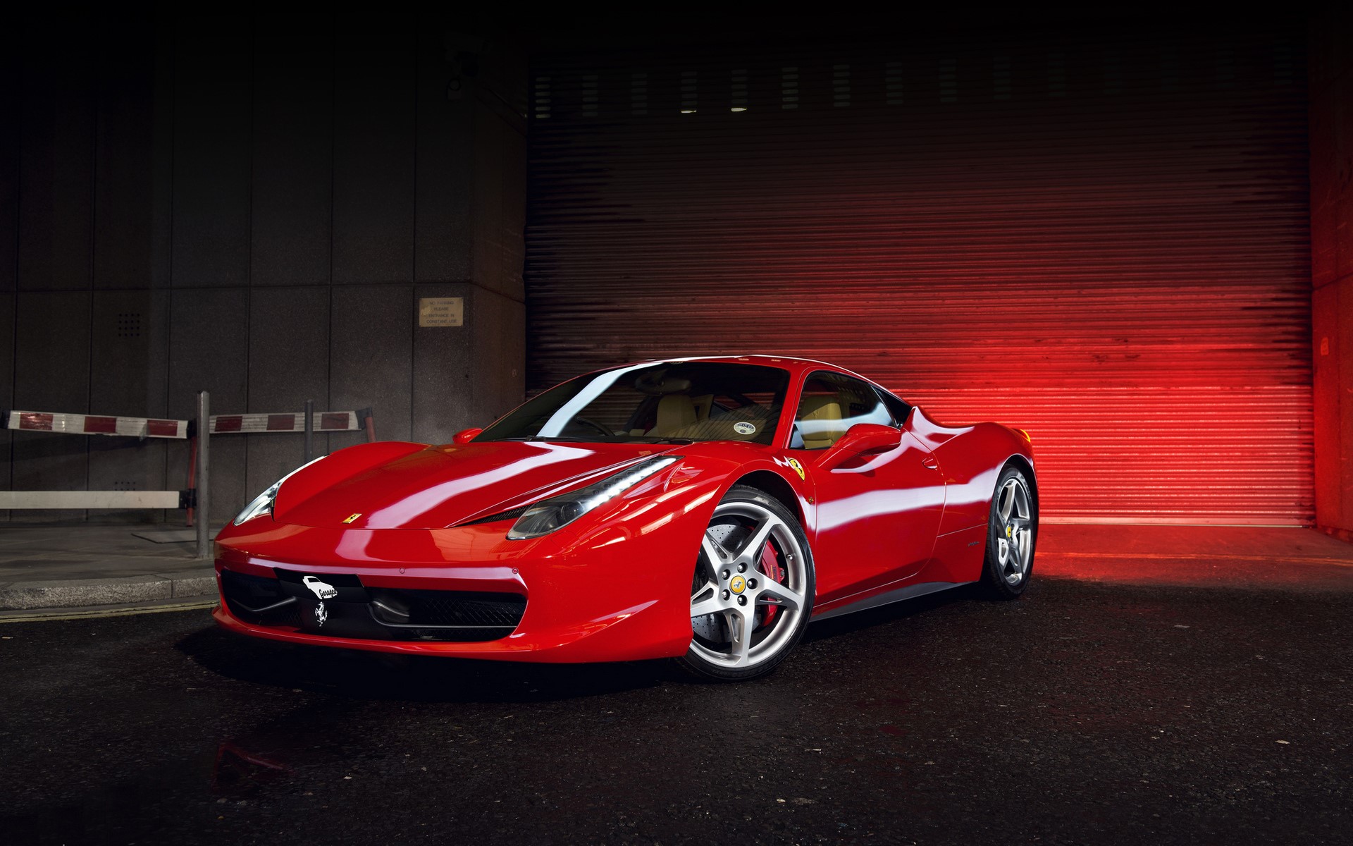 Red Ferrari 458 Italia parked in front of a garage HD Wallpaper