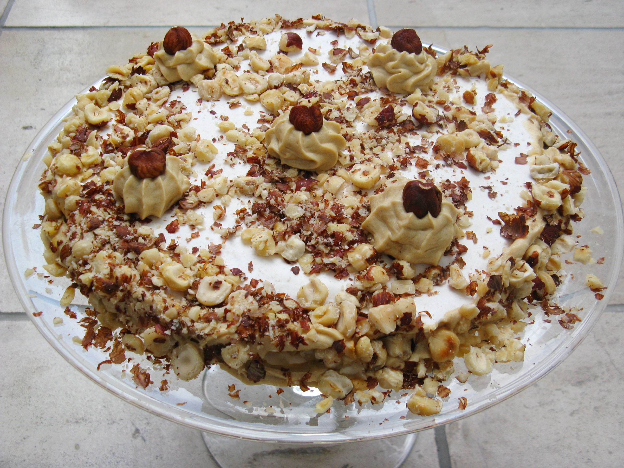Hazelnut cake with cream and nuts HD Wallpaper