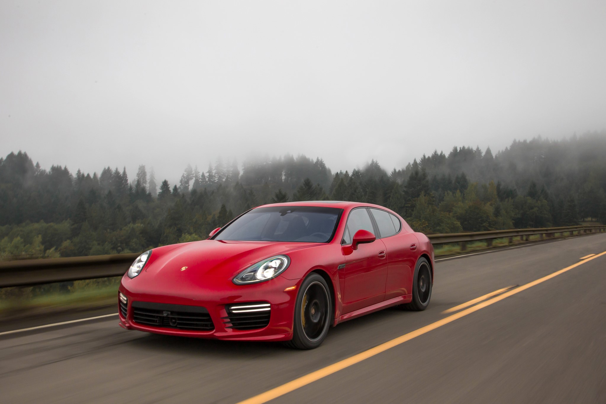 Red 2014 Porsche Panamera Turbo driving on a foggy road HD Wallpaper