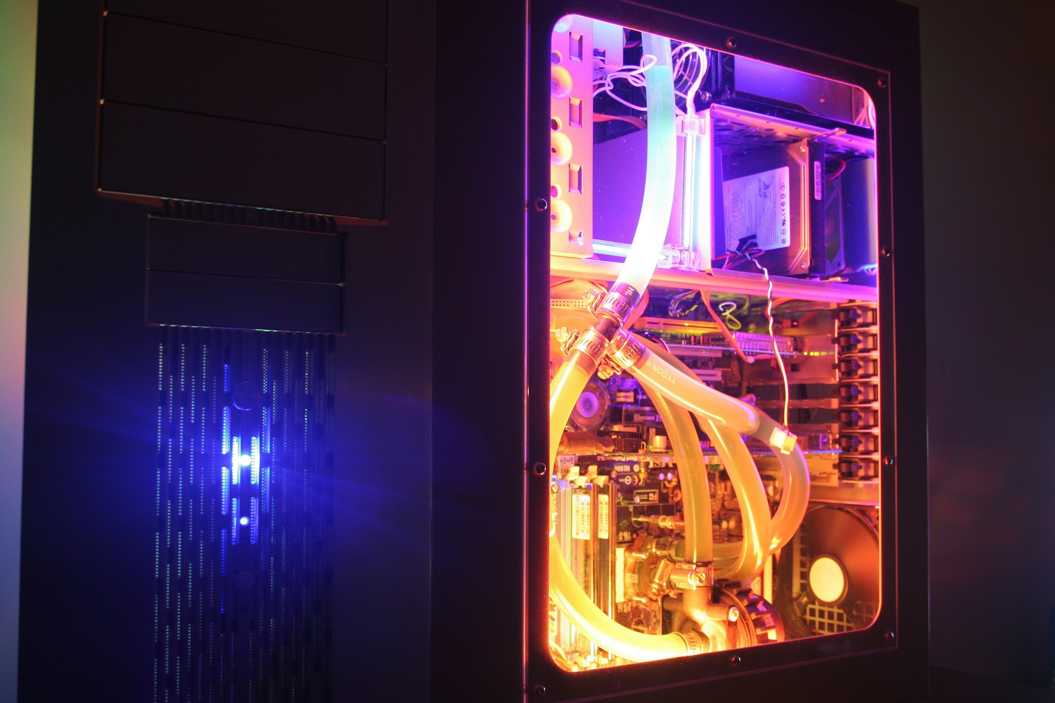 Custom water-cooled PC with RGB lighting HD Wallpaper