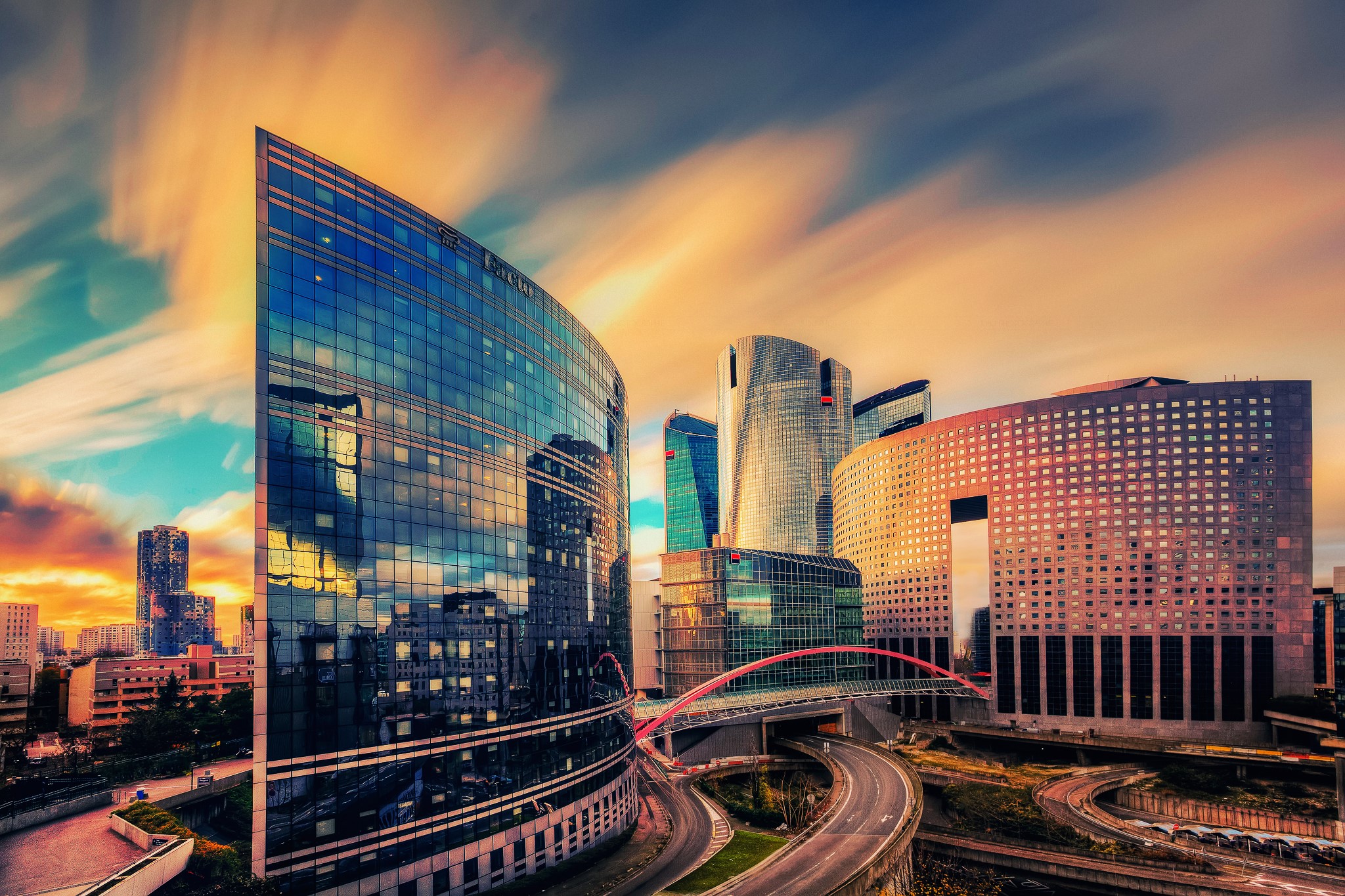 Modern skyscrapers and a bridge in La Défense, Paris, France HD Wallpaper