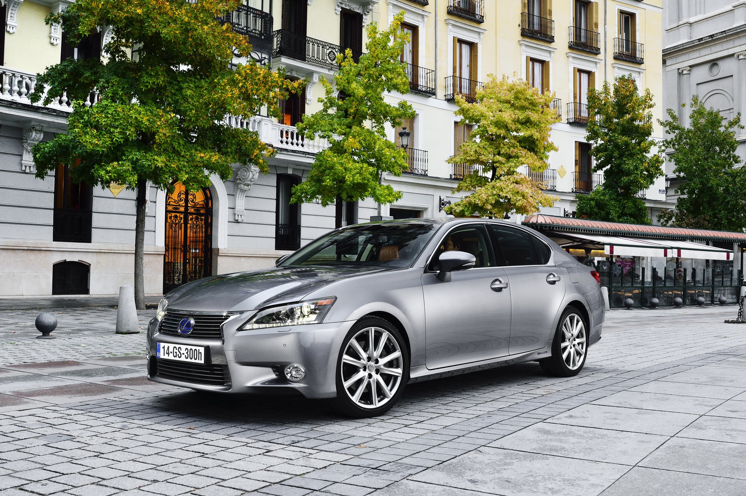2014 Lexus GS 300h parked on a cobblestone street HD Wallpaper