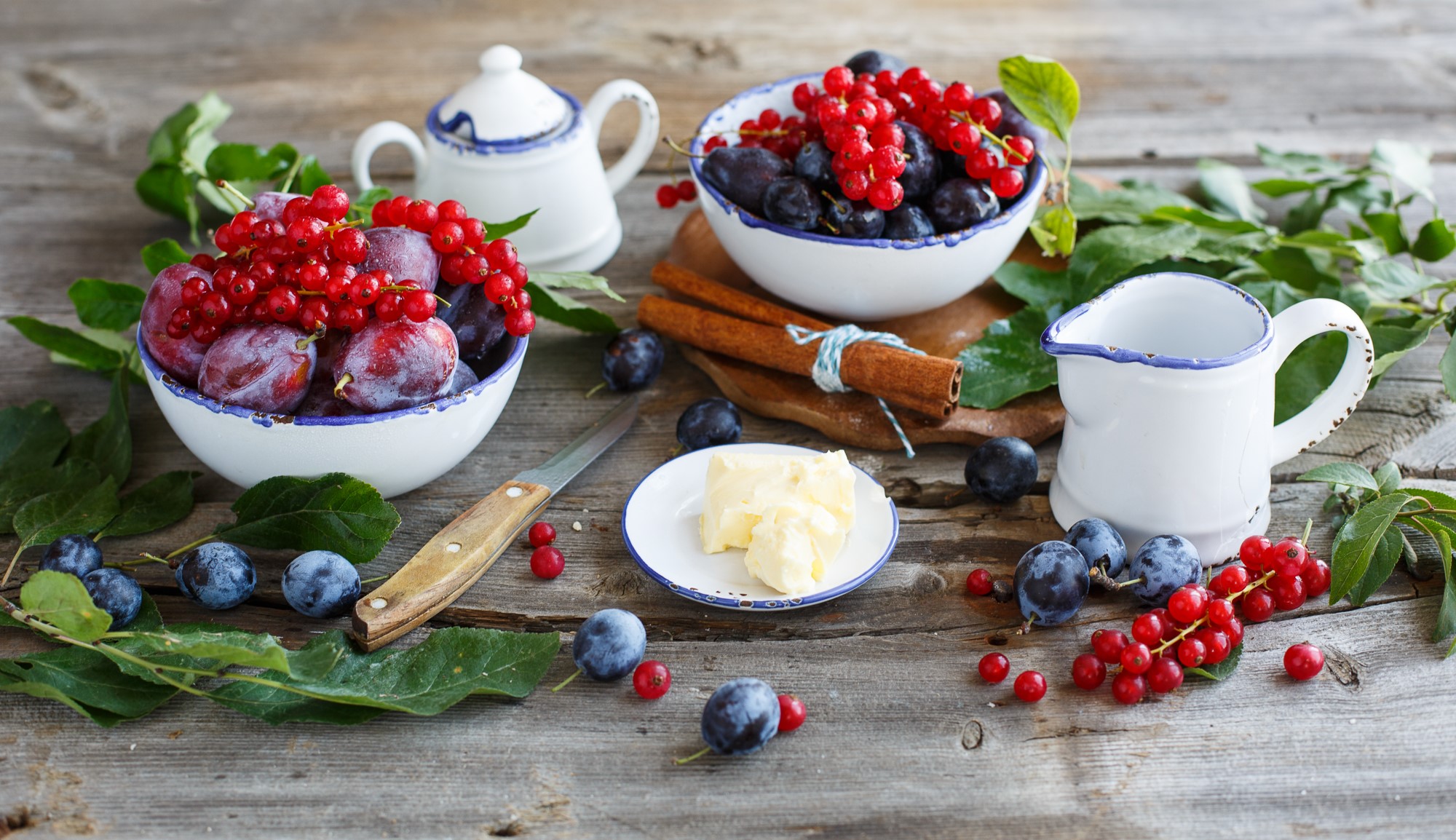 Still life with plums, currants, butter, and cinnamon HD Wallpaper