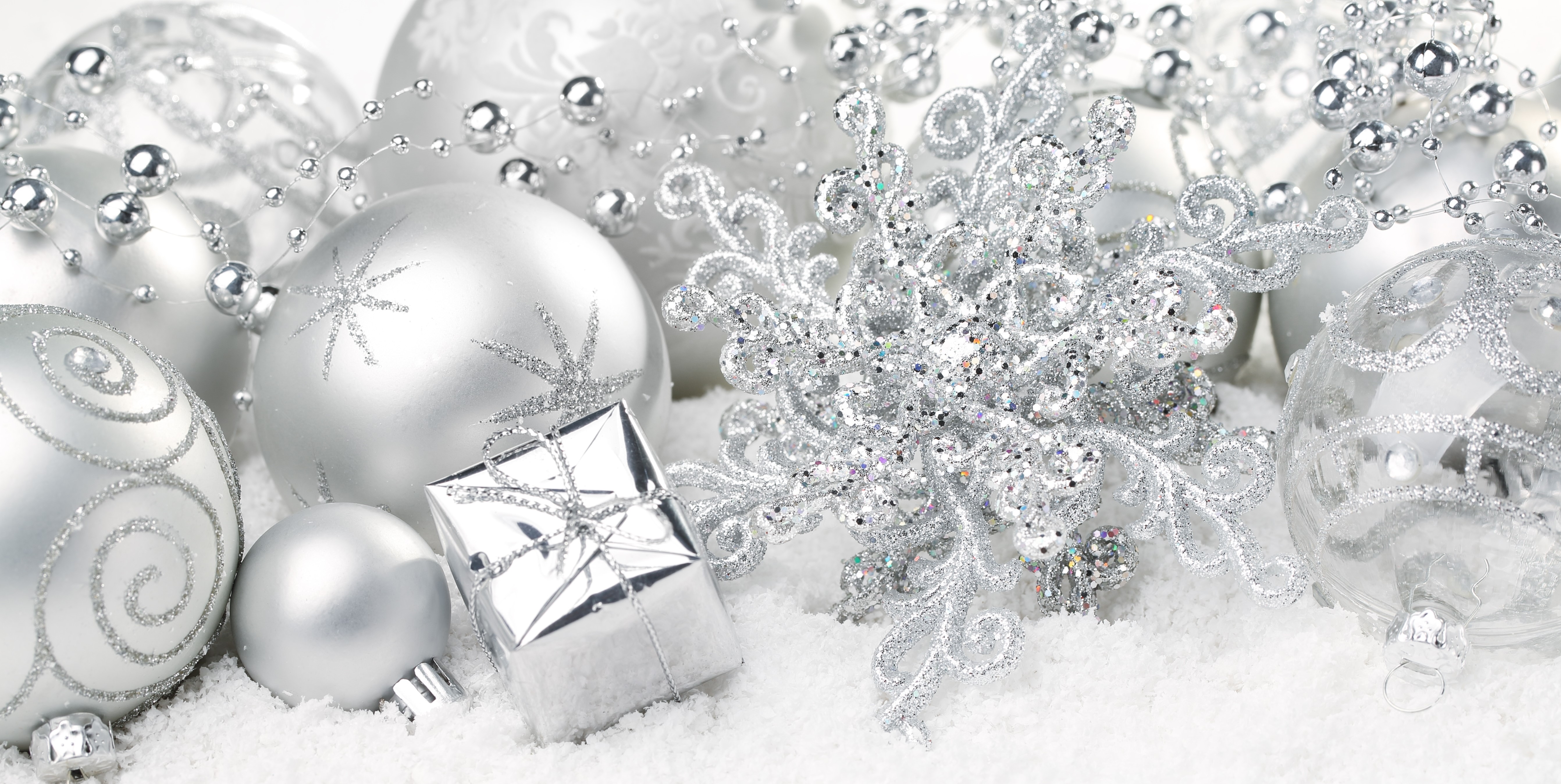Christmas ornaments and decorations in snow HD Wallpaper