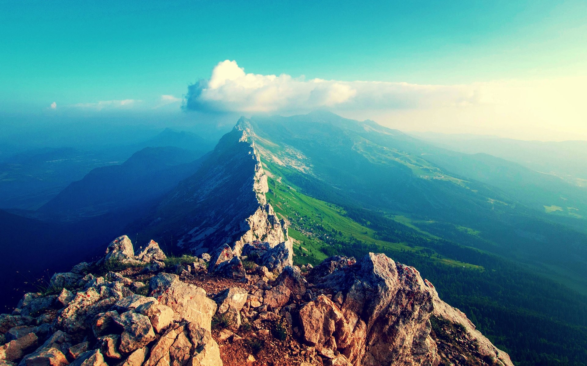 Mountain ridge with green slopes and blue sky HD Wallpaper