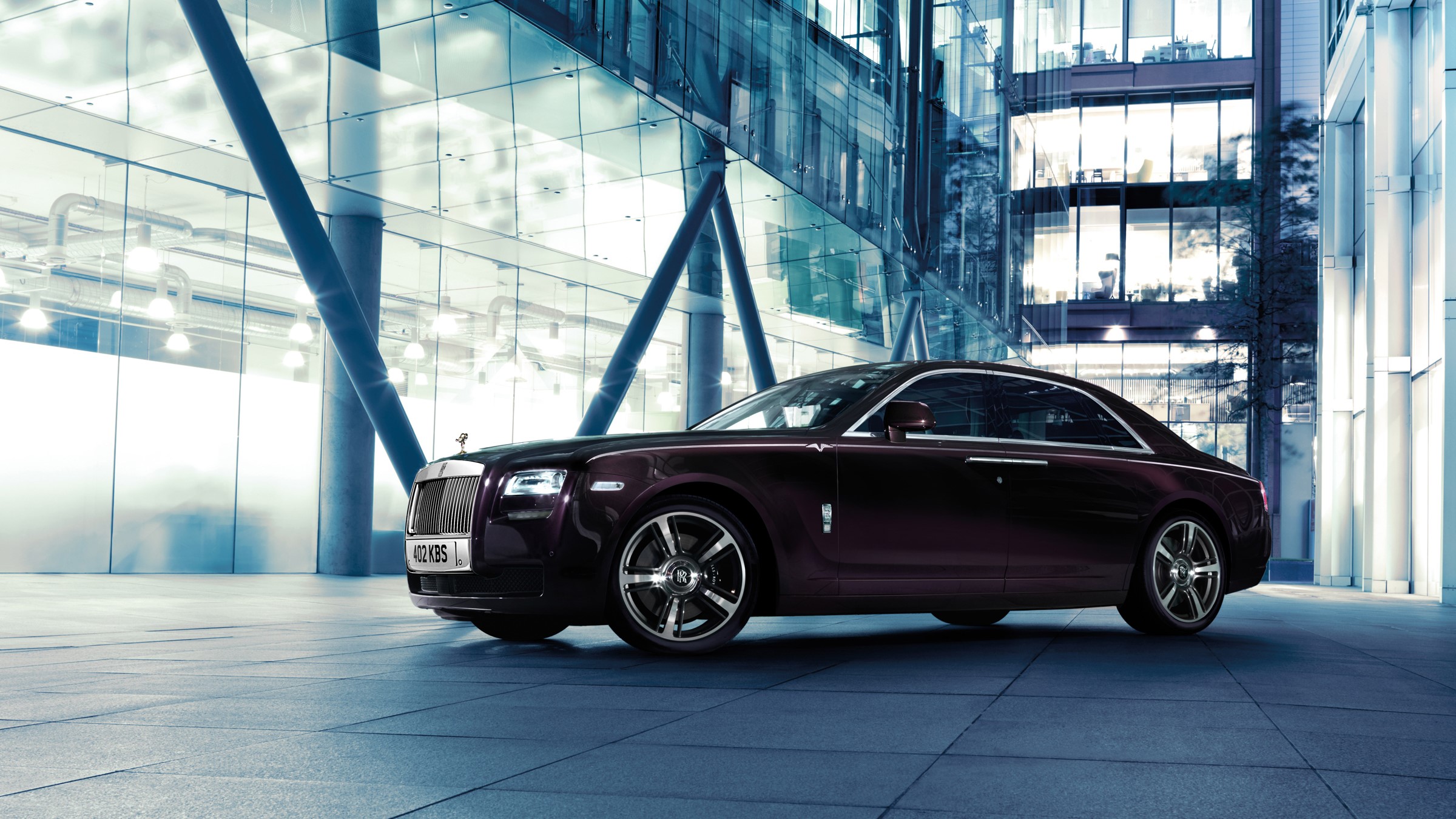 Rolls-Royce Ghost Coupe in front of modern building HD Wallpaper