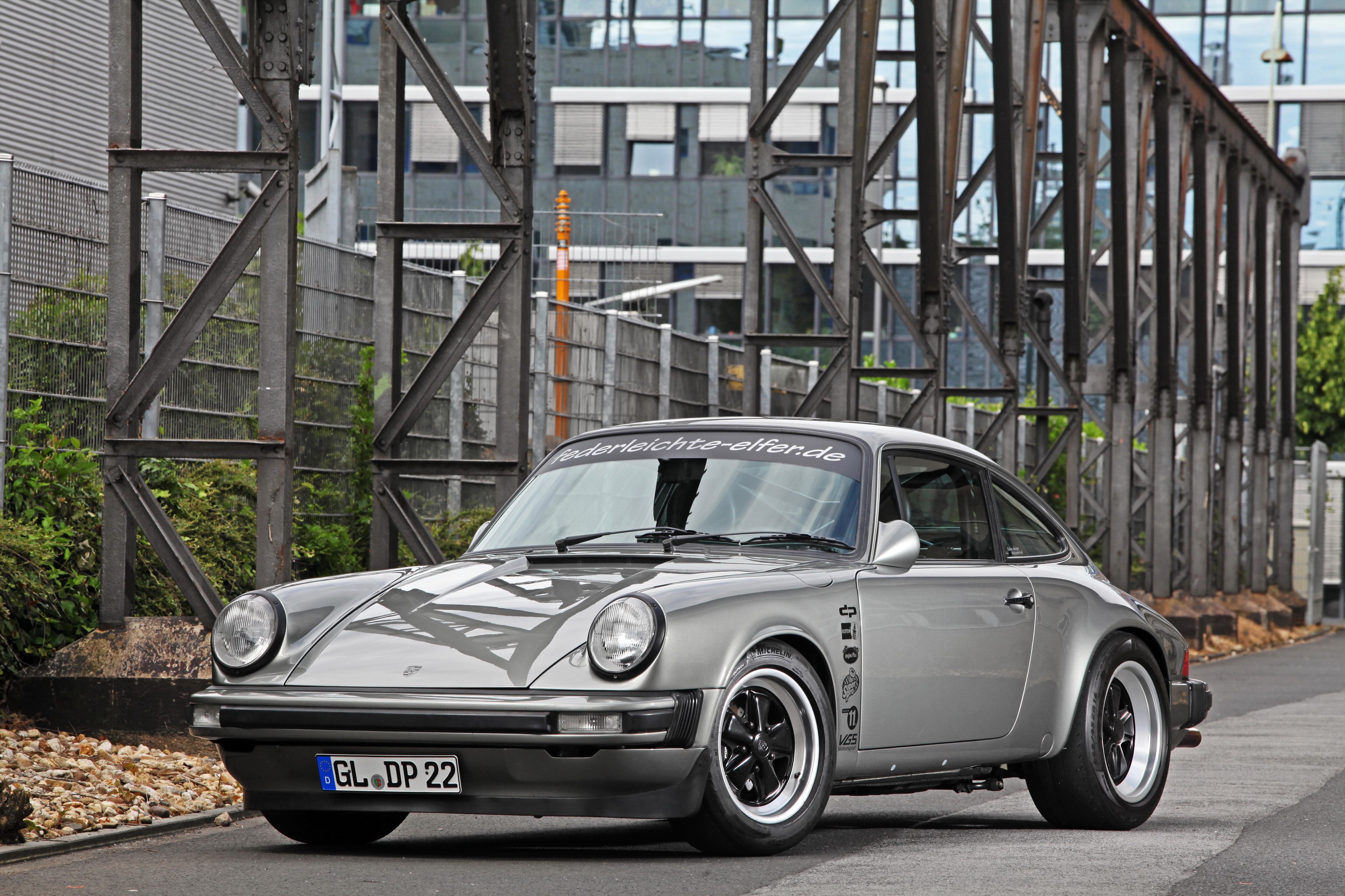 Grey Porsche 911 (DP Motosport) parked outdoors HD Wallpaper