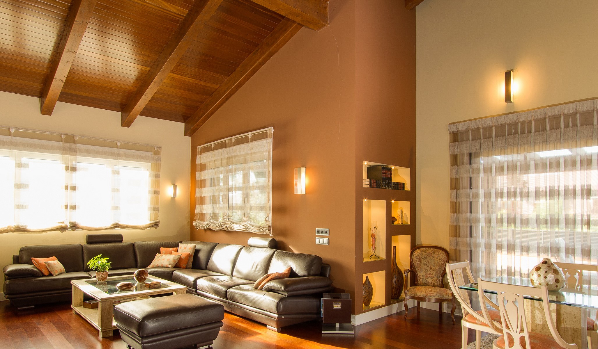 Living room with sectional sofa and dining area HD Wallpaper