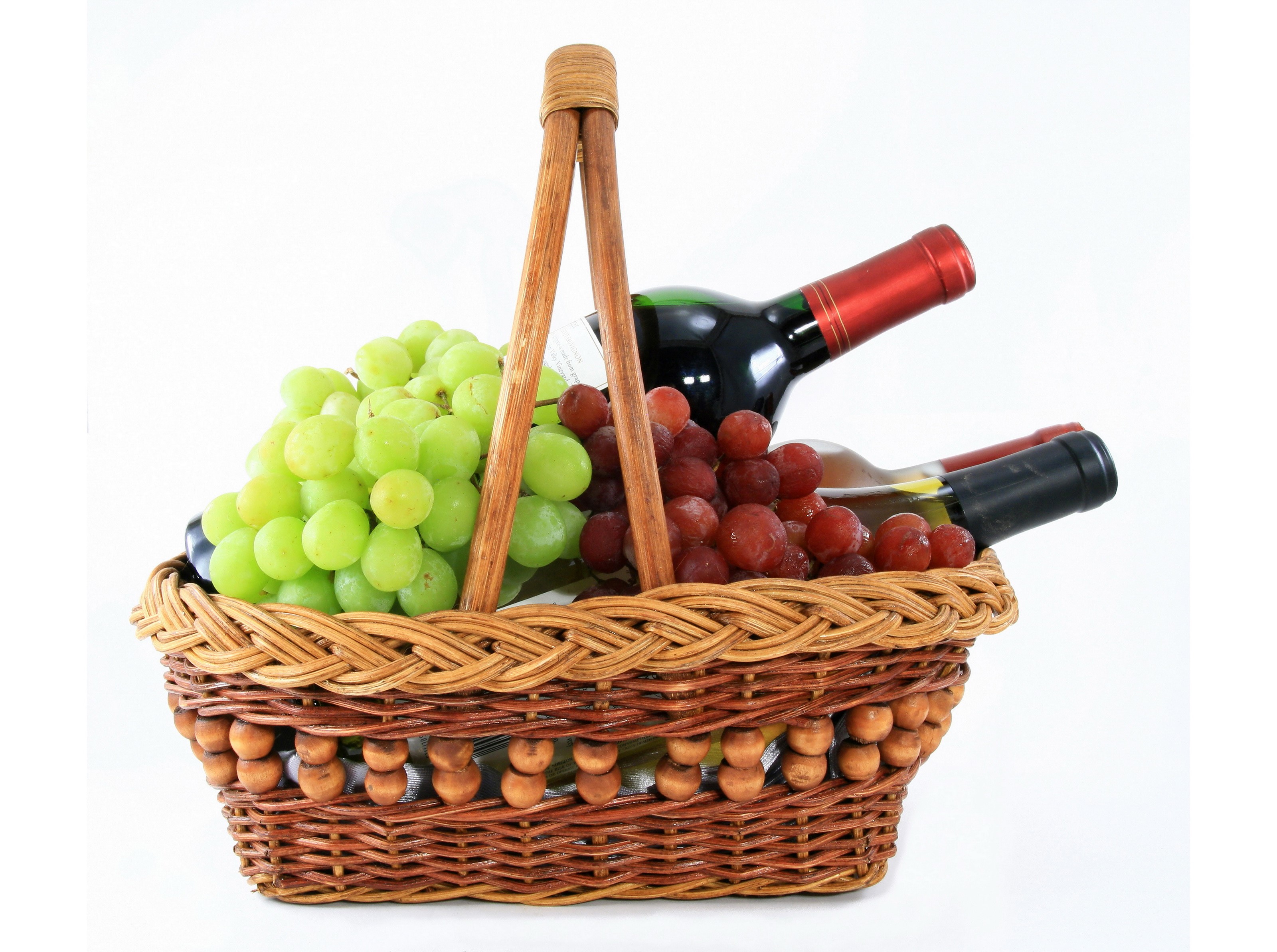 Wicker basket with wine bottles and grapes HD Wallpaper