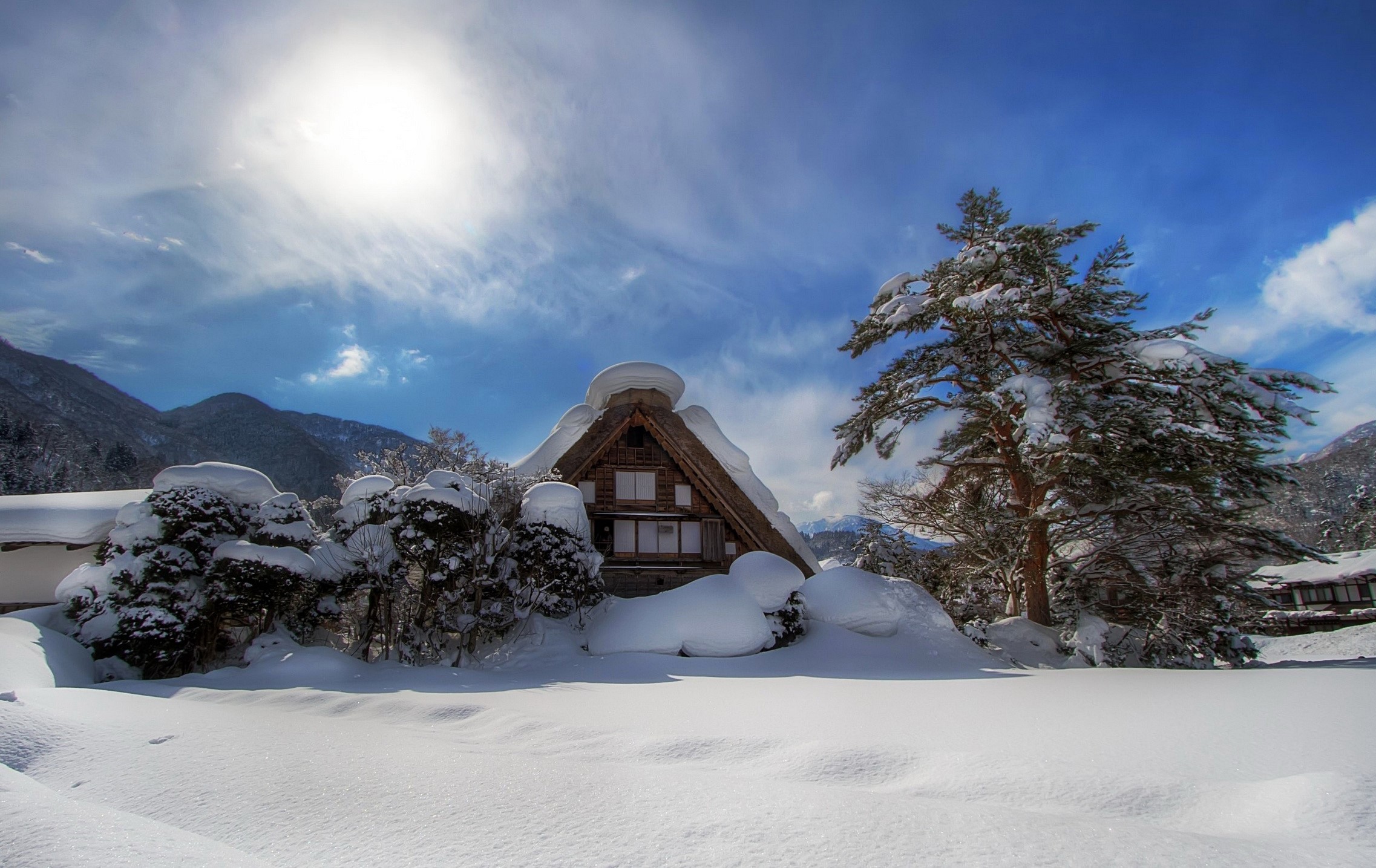 Traditional Japanese house in Shirakawa-go during winter HD Wallpaper