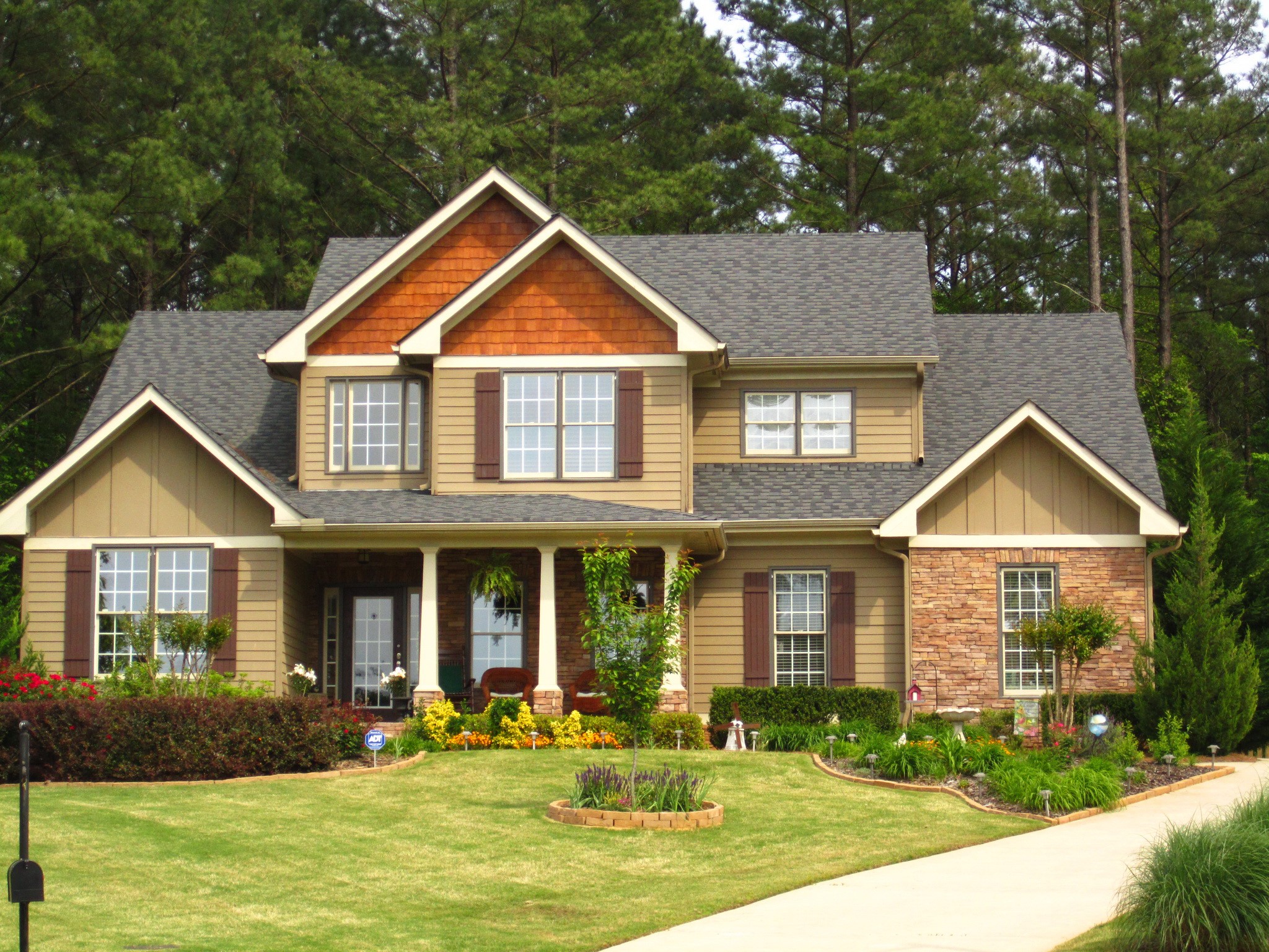 Suburban house with landscaping and trees HD Wallpaper