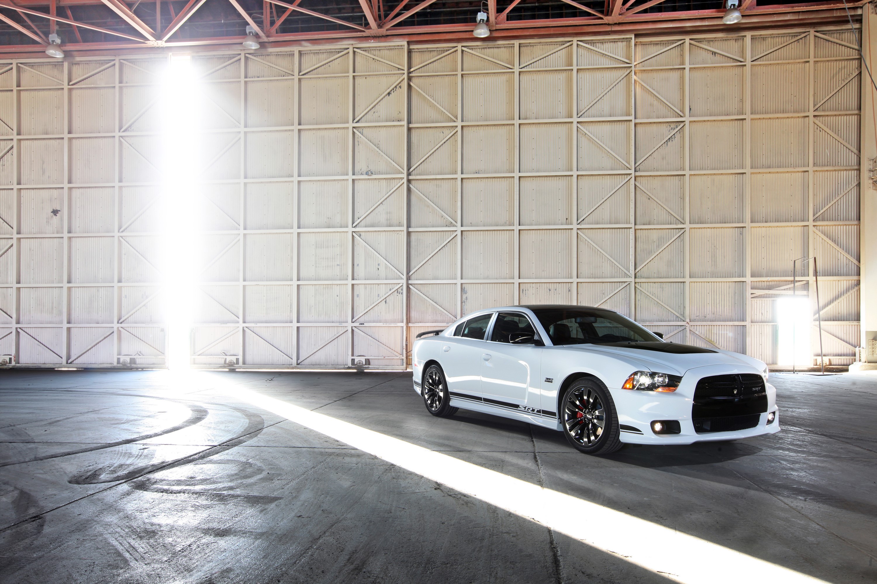 White 2013 Dodge Charger SRT8 in a hangar HD Wallpaper