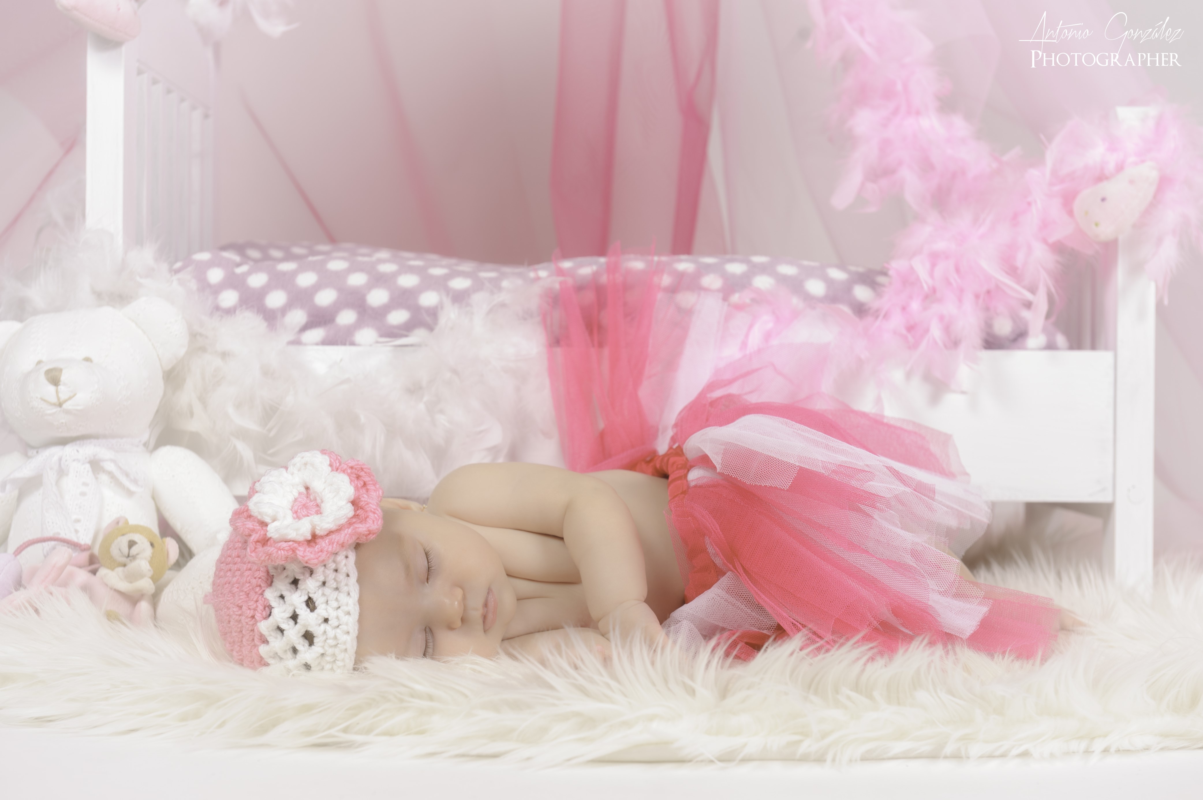 Infant Sleeping in Pink Tutu and Hat HD Wallpaper