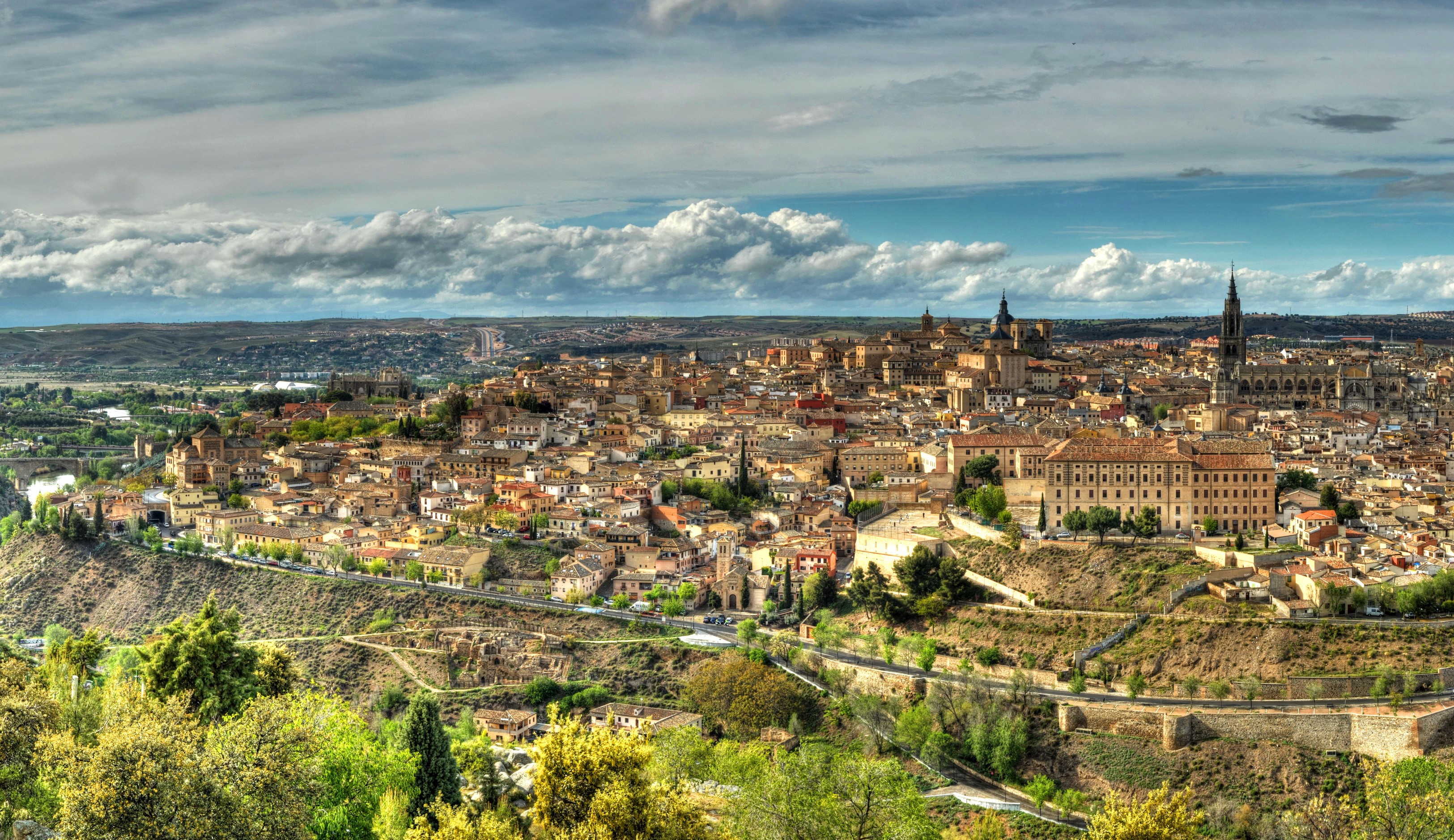 Panoramic view of Toledo, Spain with clouds HD Wallpaper