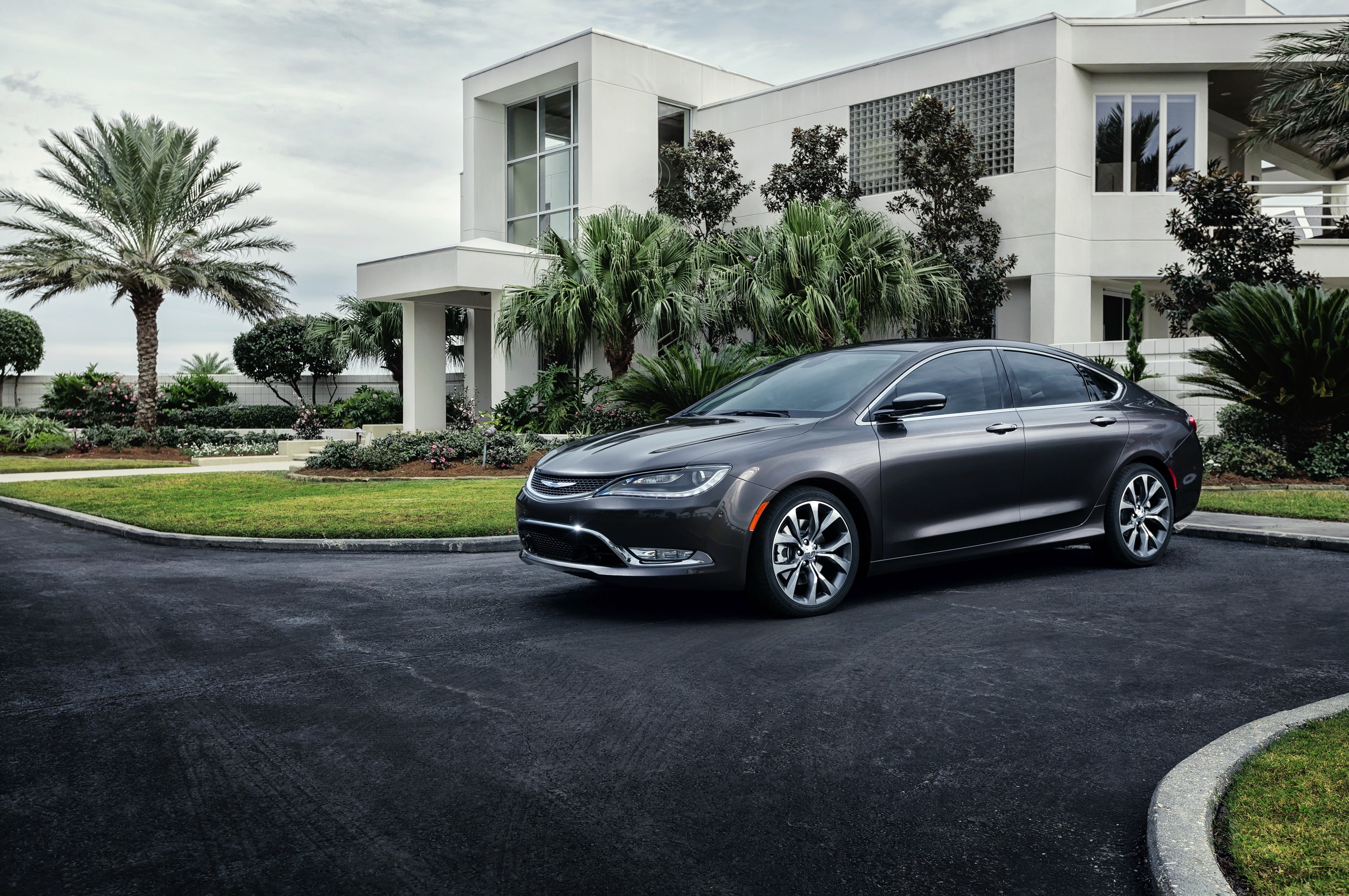 2014 Chrysler 200 Sedan in front of a modern house HD Wallpaper