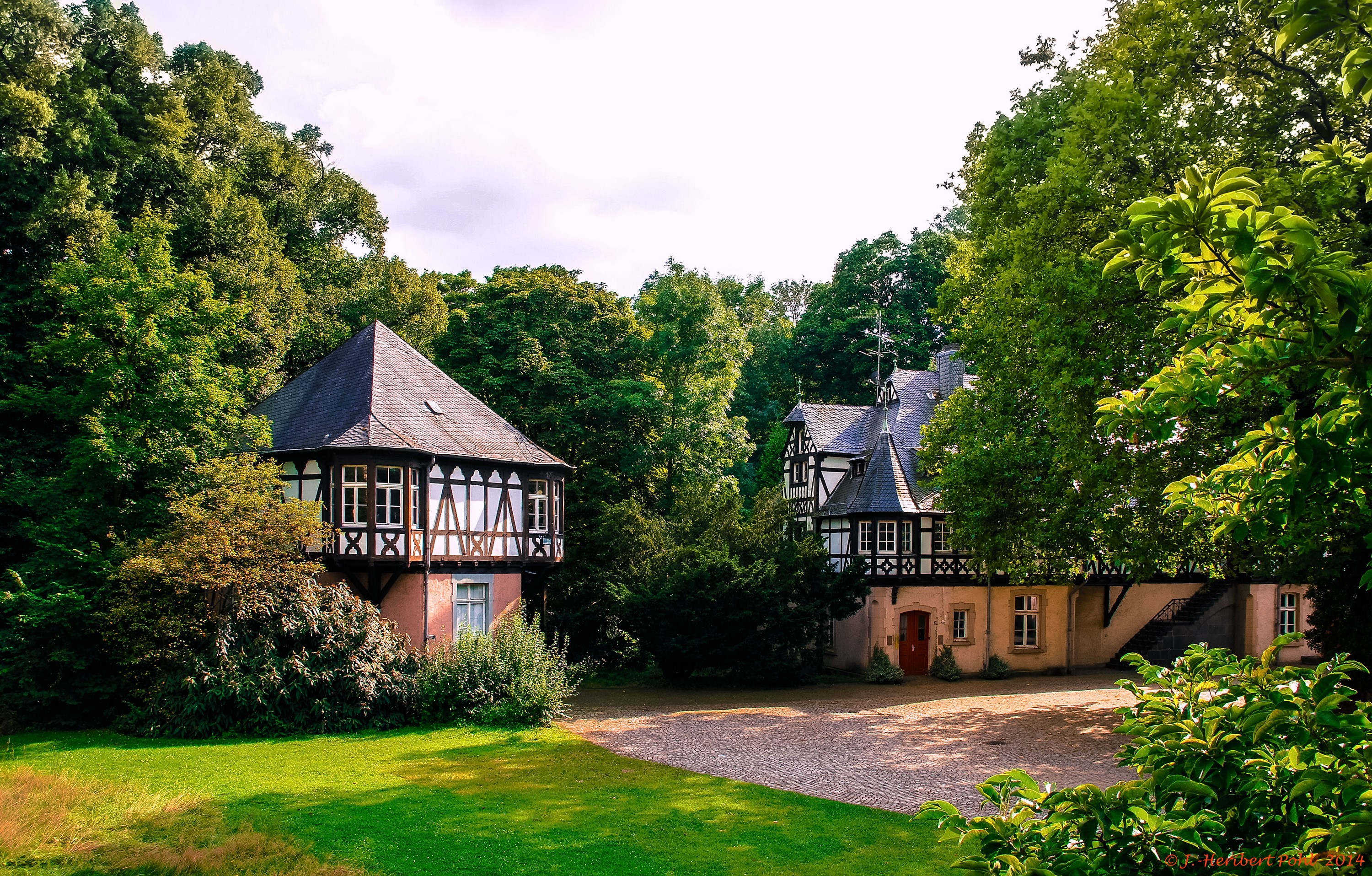 Half-timbered houses in a park in Eller, Germany HD Wallpaper