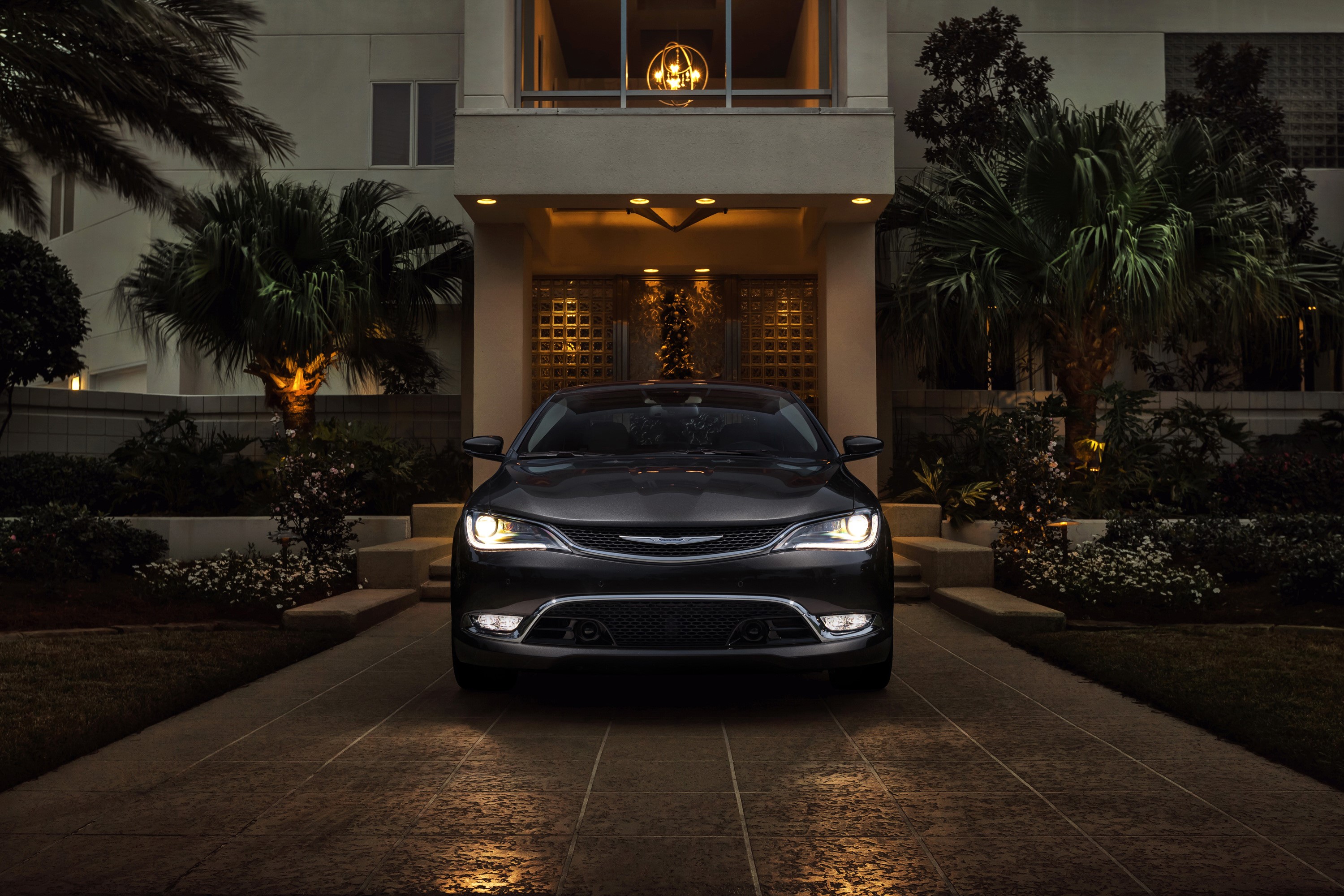 Chrysler 200 Sedan parked in front of a modern house at night HD Wallpaper