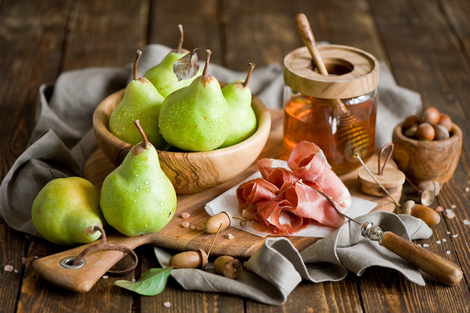 Pears, Honey, Nuts, and Prosciutto on a Wooden Table HD Wallpaper