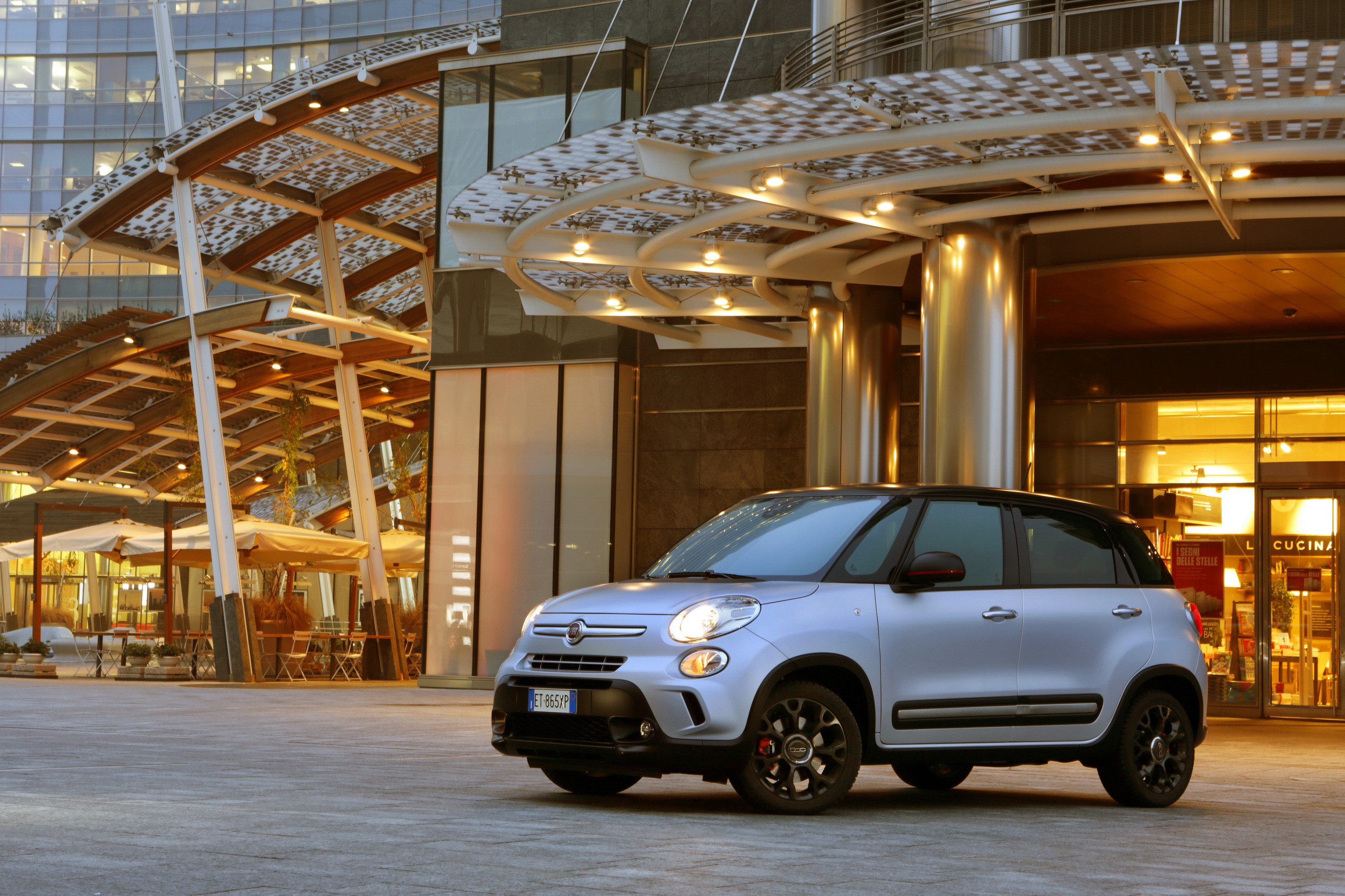 Silver Fiat 500L Beats Edition parked outside a modern building HD Wallpaper