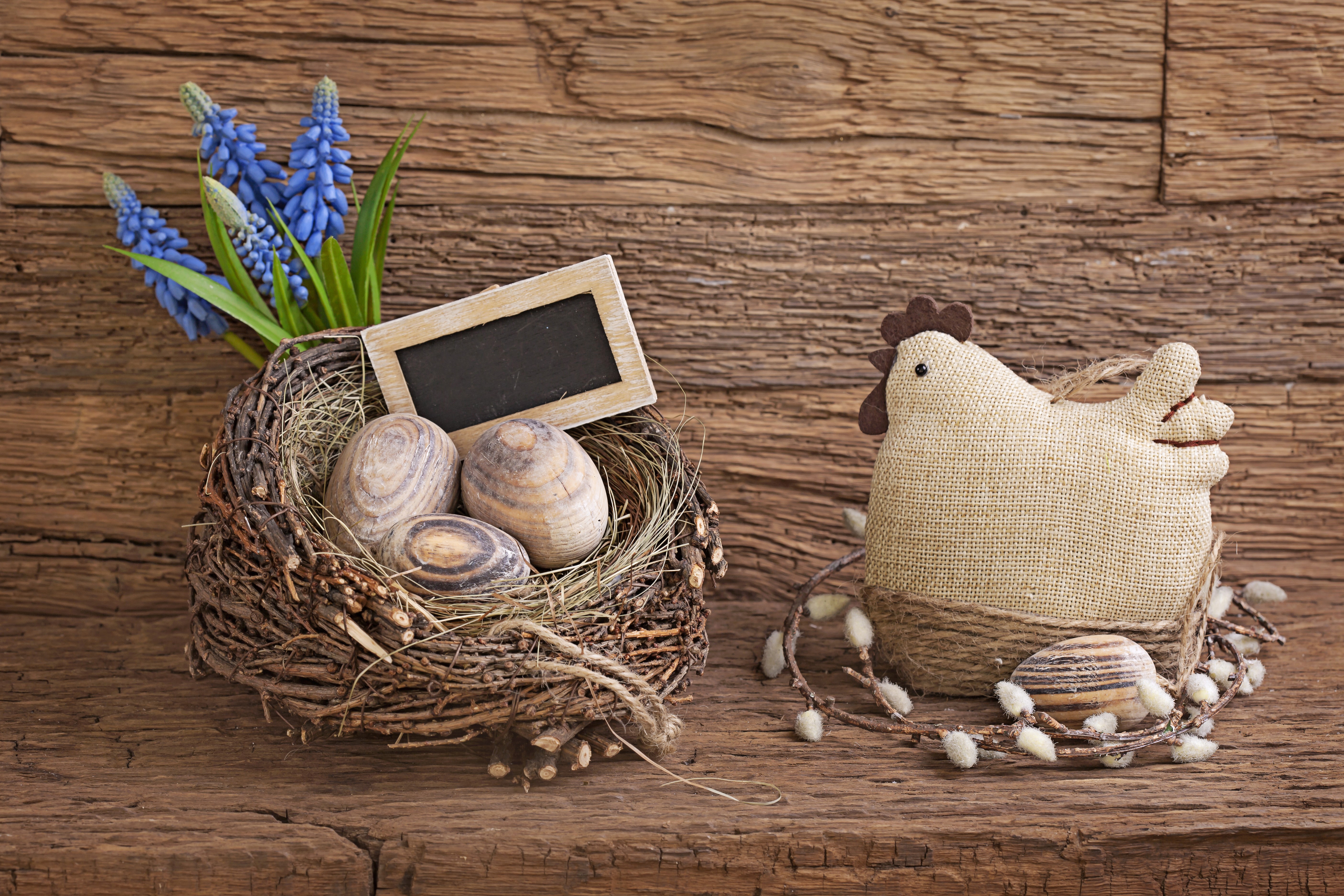 Easter nest with eggs, flowers, and chicken decoration HD Wallpaper