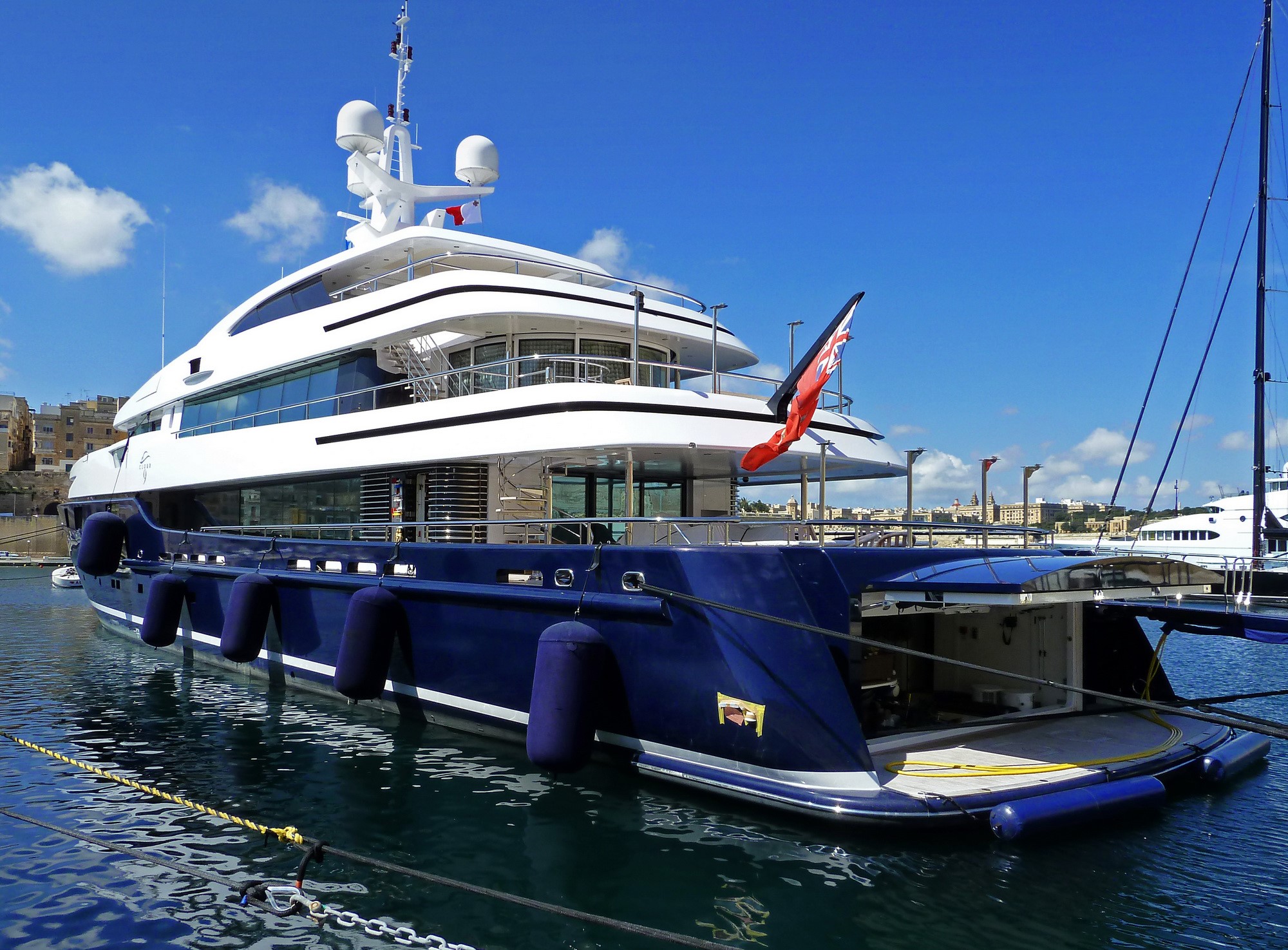 Superyacht Cloud docked in a harbor HD Wallpaper