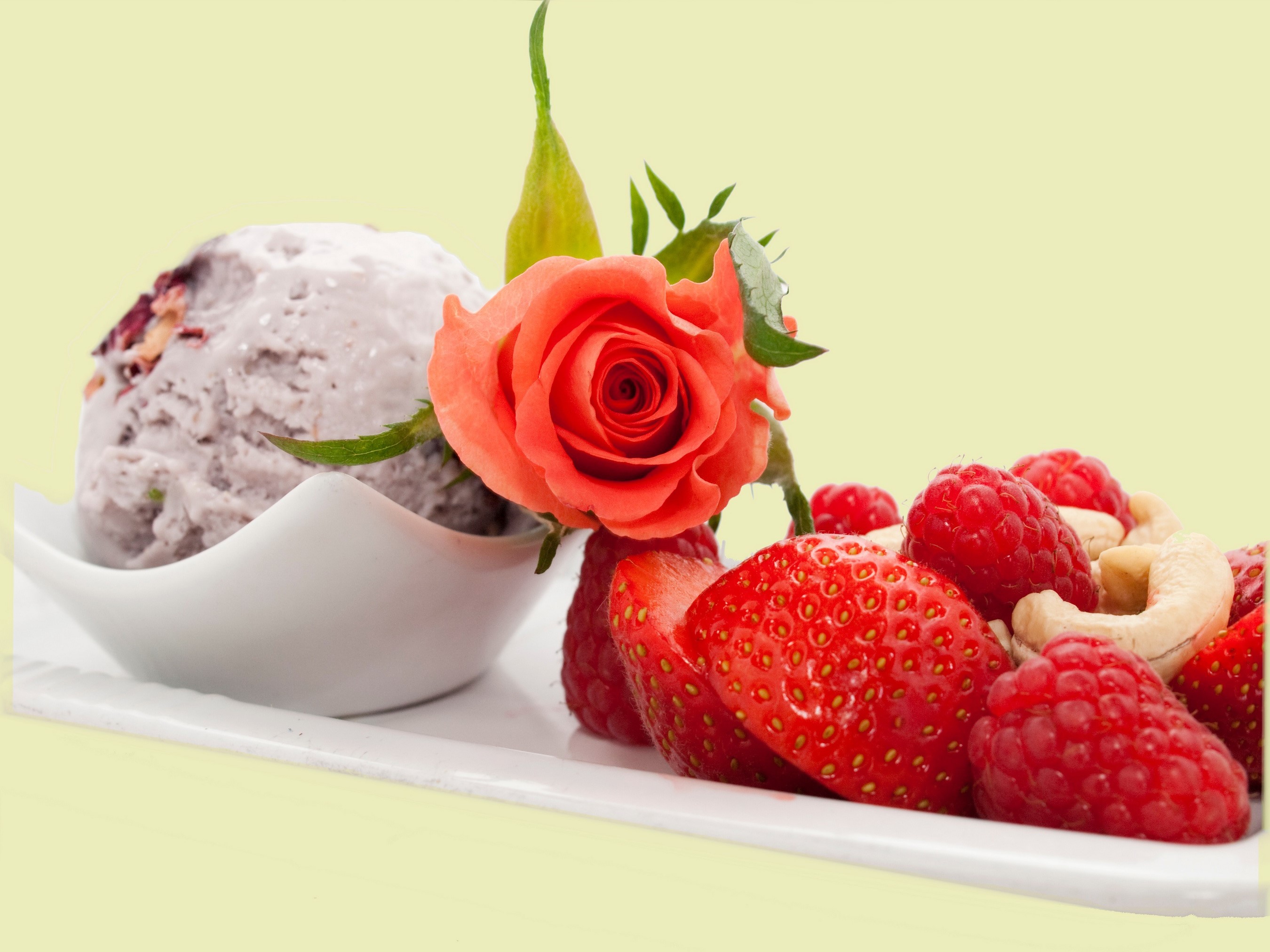 Ice cream with strawberries, raspberries, cashews, and a rose HD Wallpaper