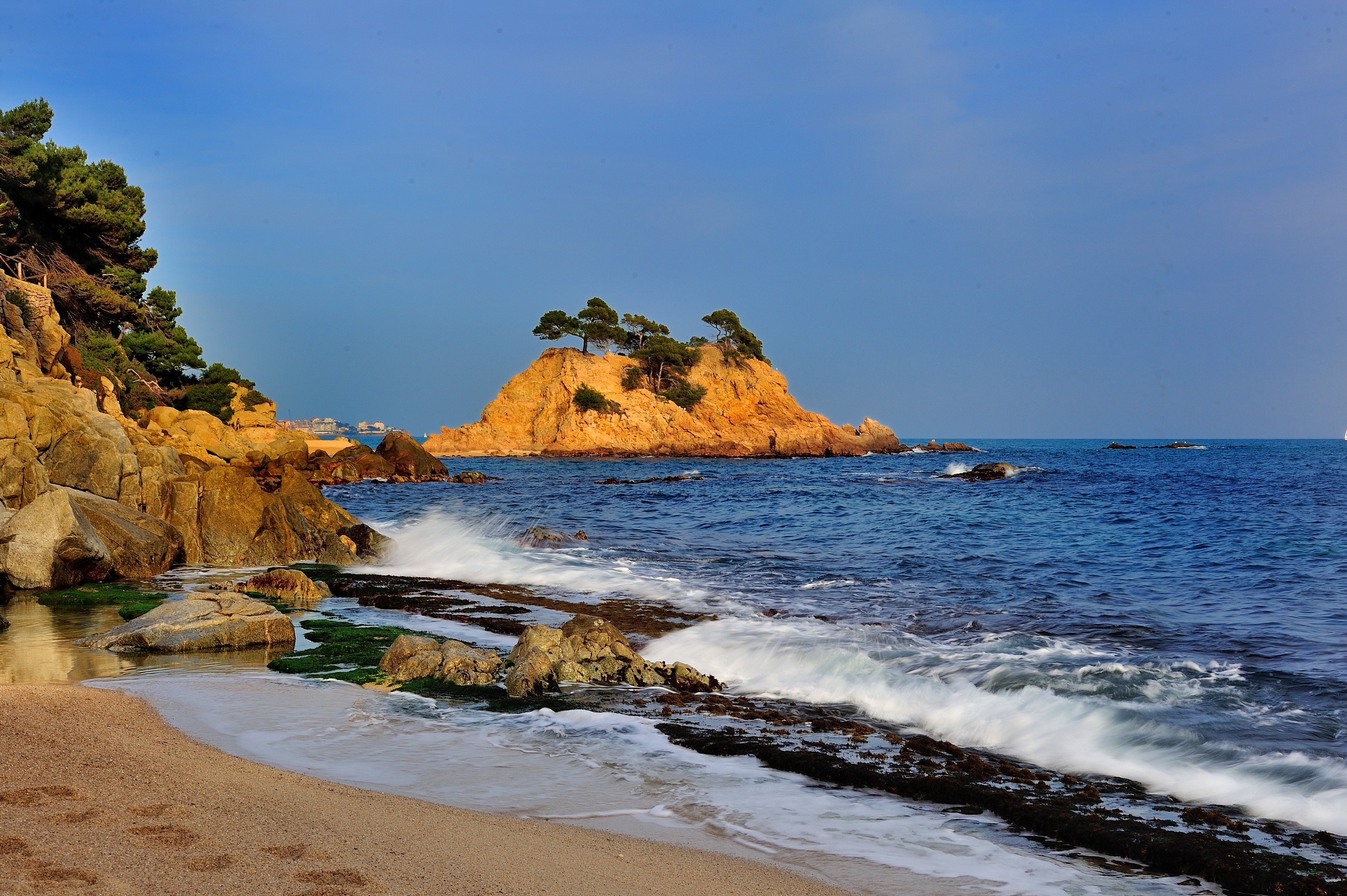Rocky Coastline with Island and Ocean in Spain HD Wallpaper