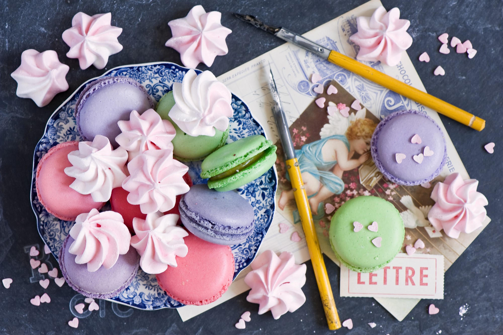 Macarons and meringues on a decorative plate HD Wallpaper