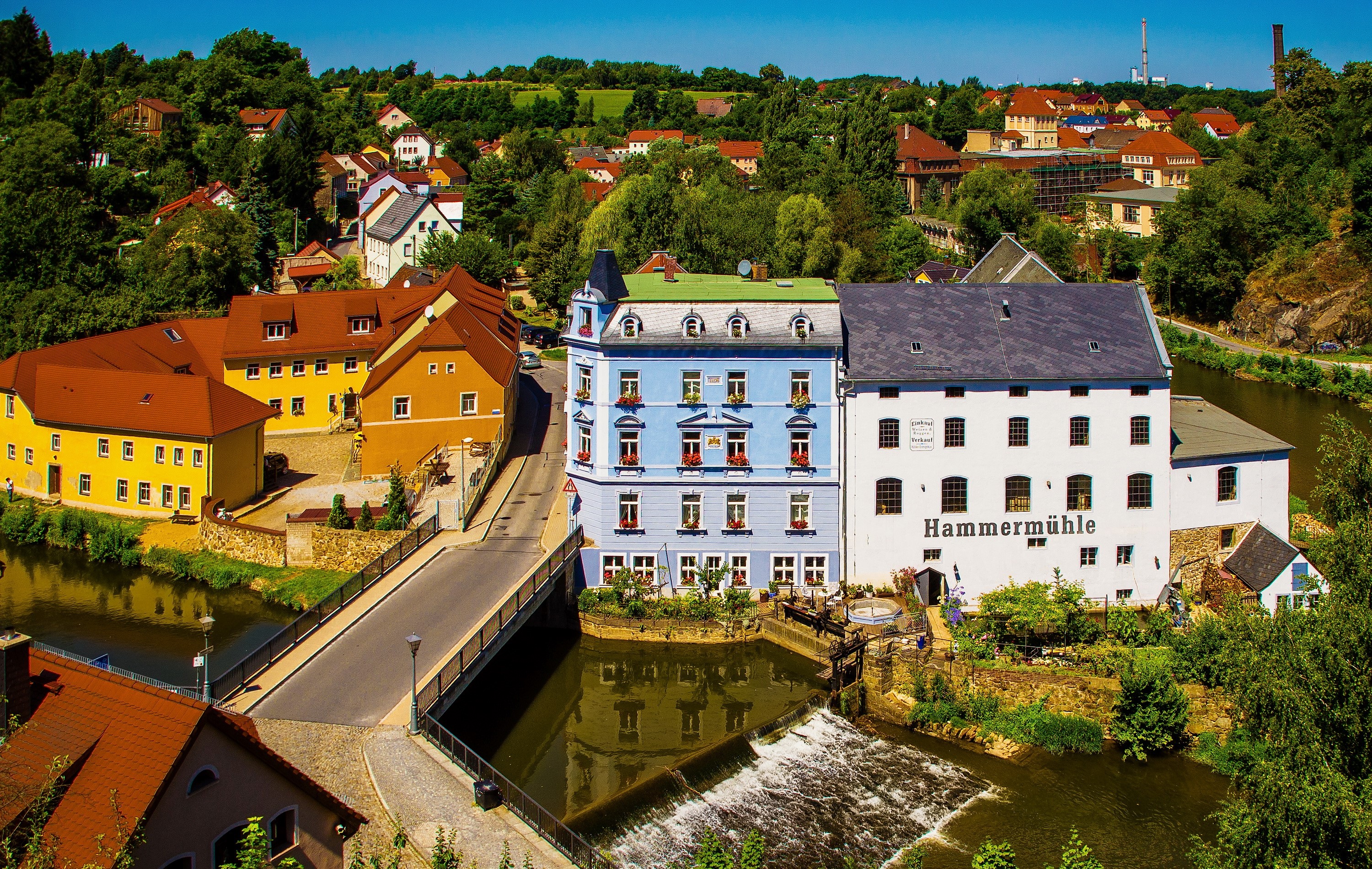 Hammermühle building and bridge over river in Bautzen, Germany HD Wallpaper
