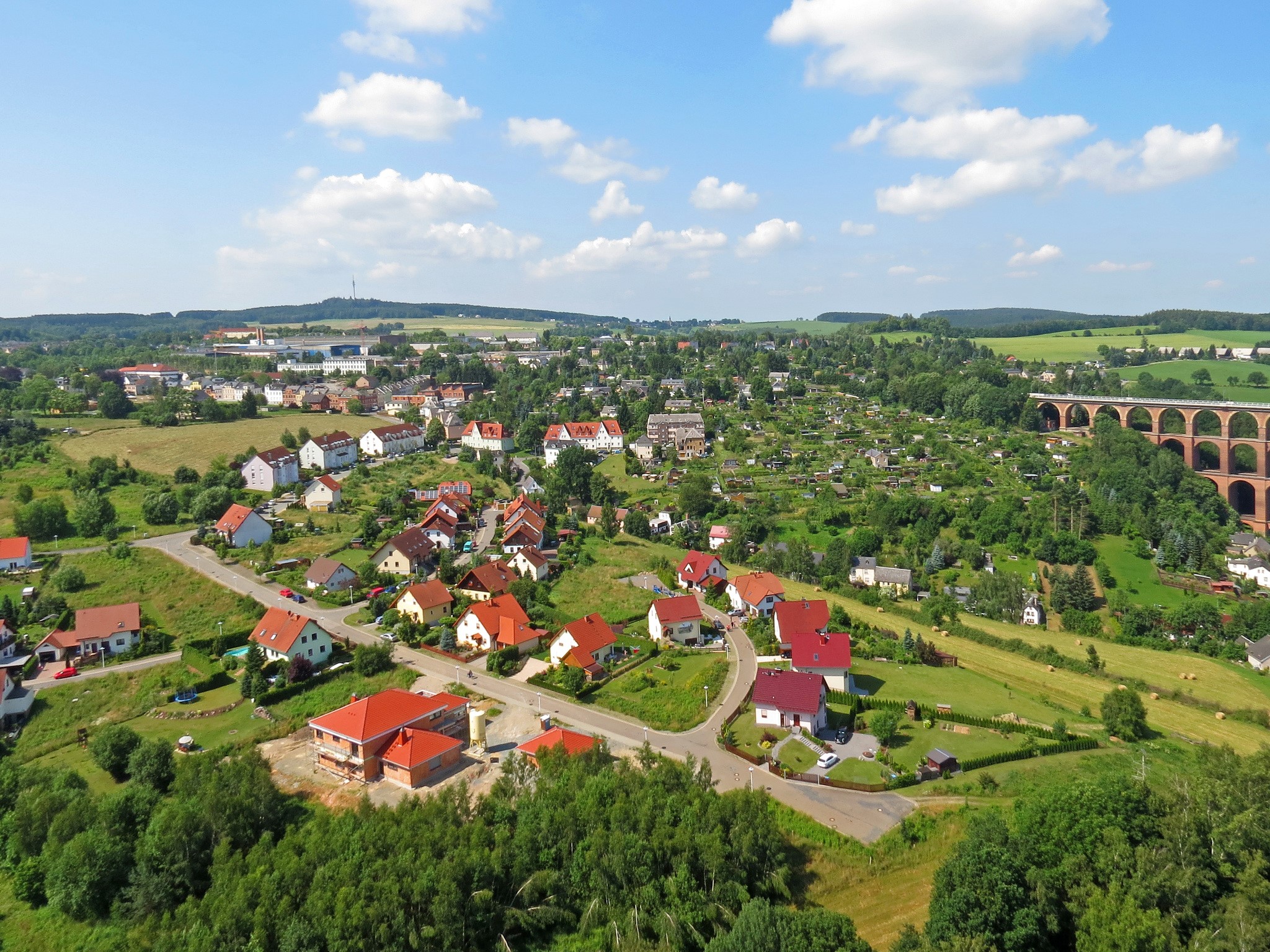 Aerial view of Netzschkau, Germany with houses and a viaduct HD Wallpaper