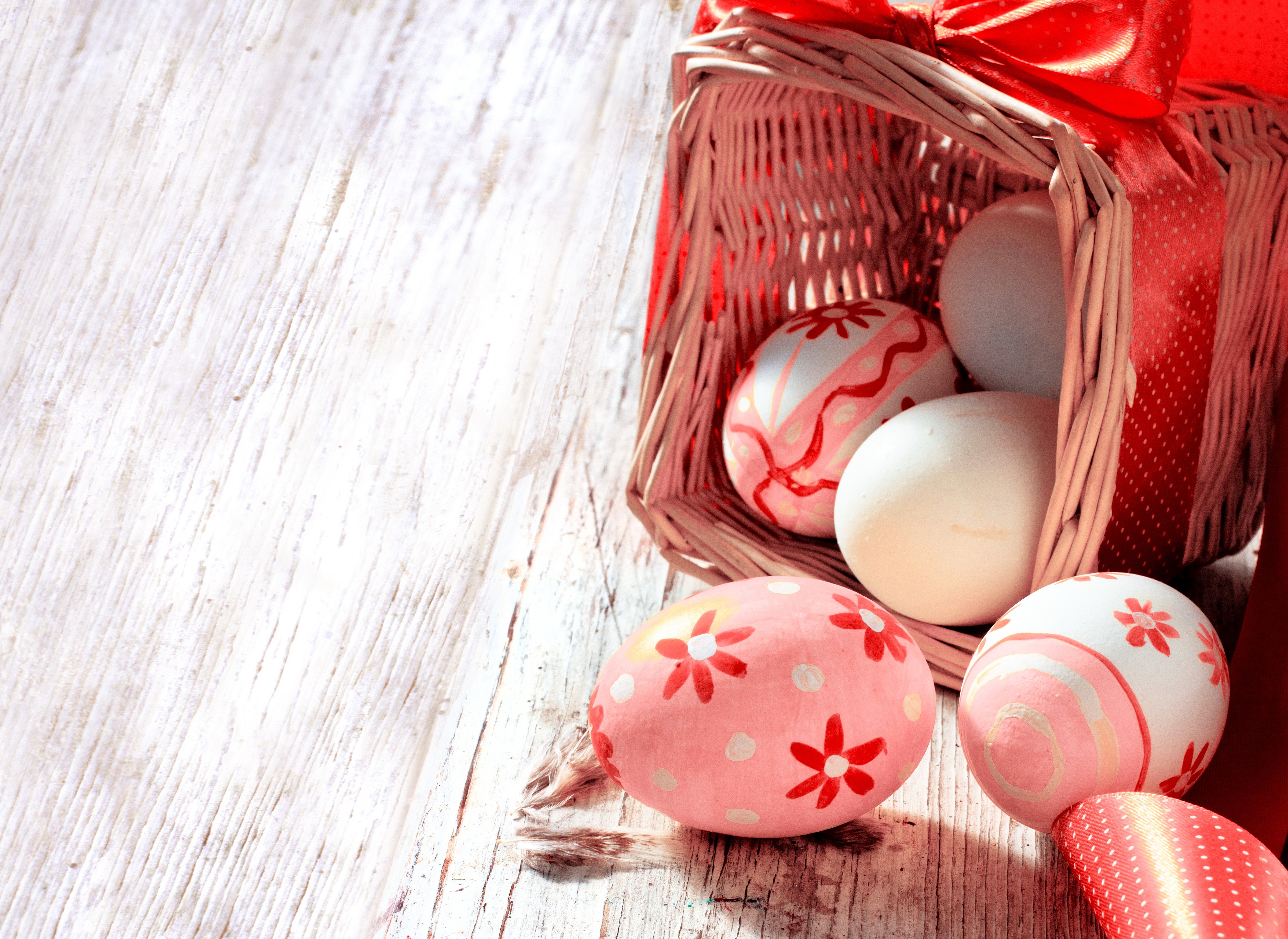 Easter Eggs in Wicker Basket with Red Ribbon HD Wallpaper