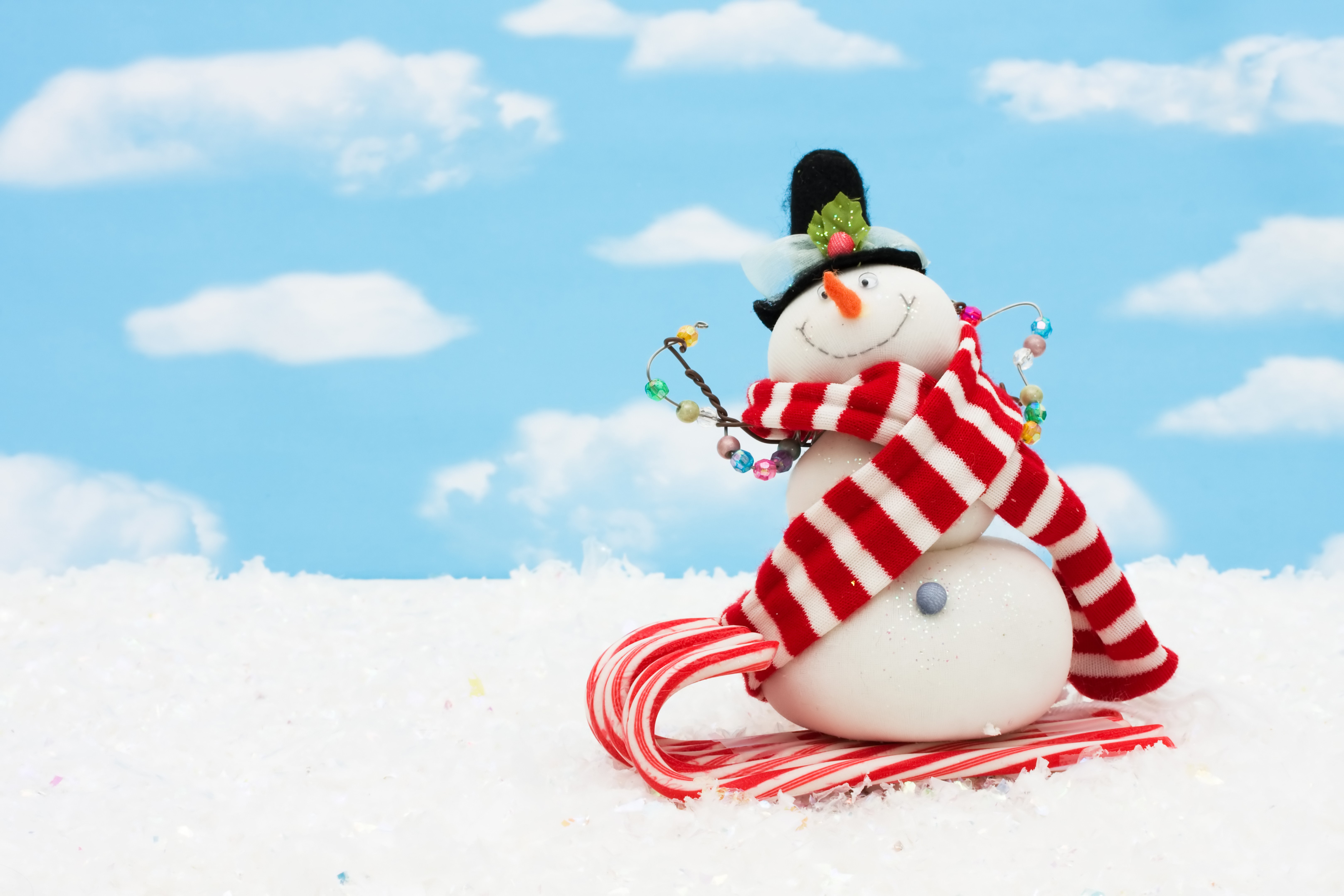 Christmas snowman on candy cane sled HD Wallpaper