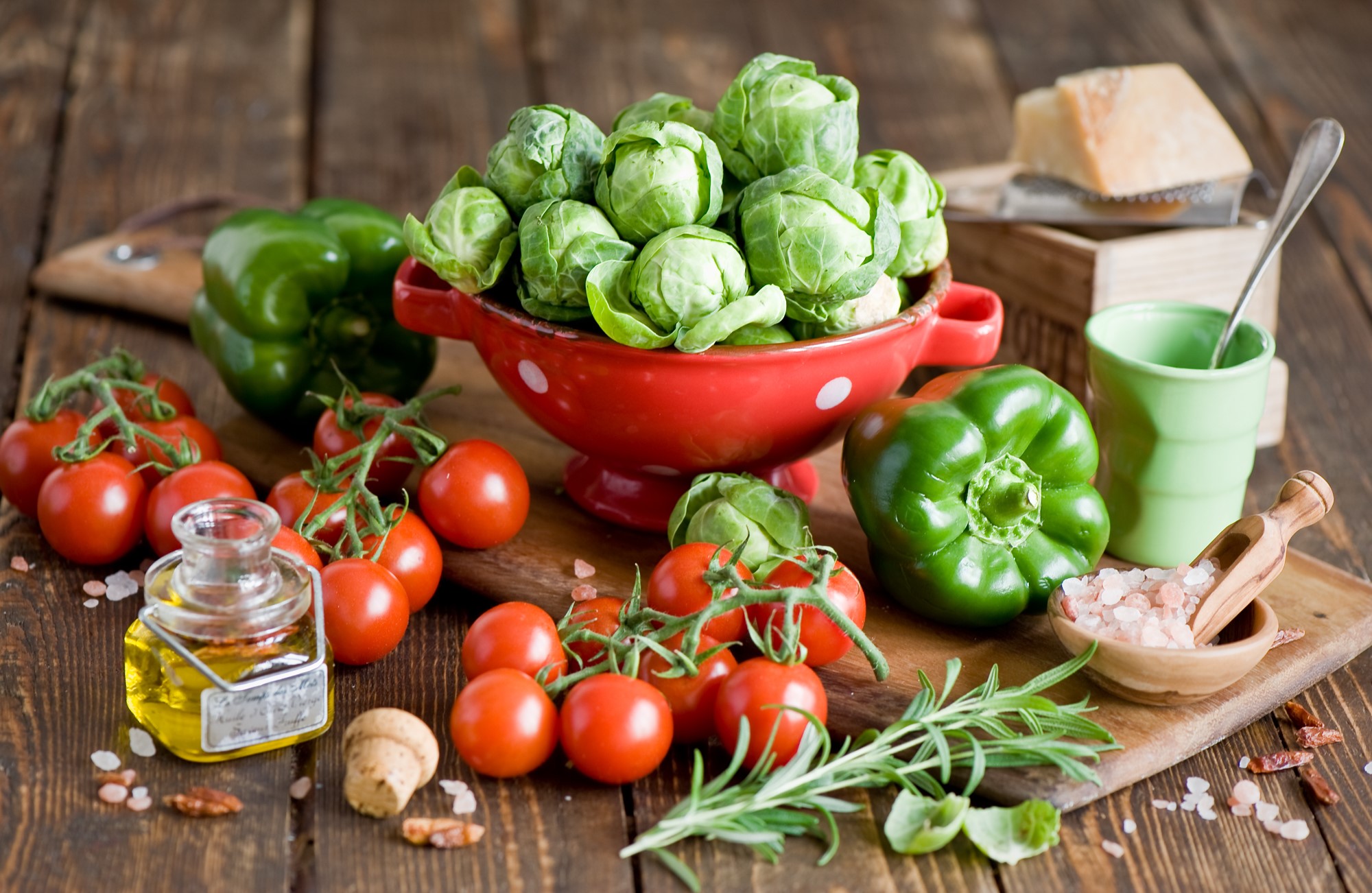 Vegetables and ingredients on a wooden table HD Wallpaper