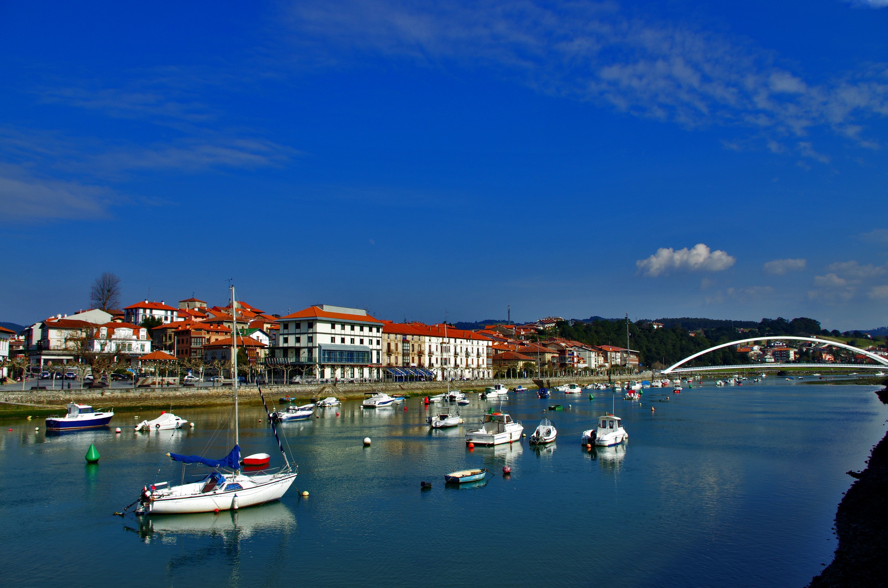 Plentzia, Spain: Riverfront with boats and bridge HD Wallpaper