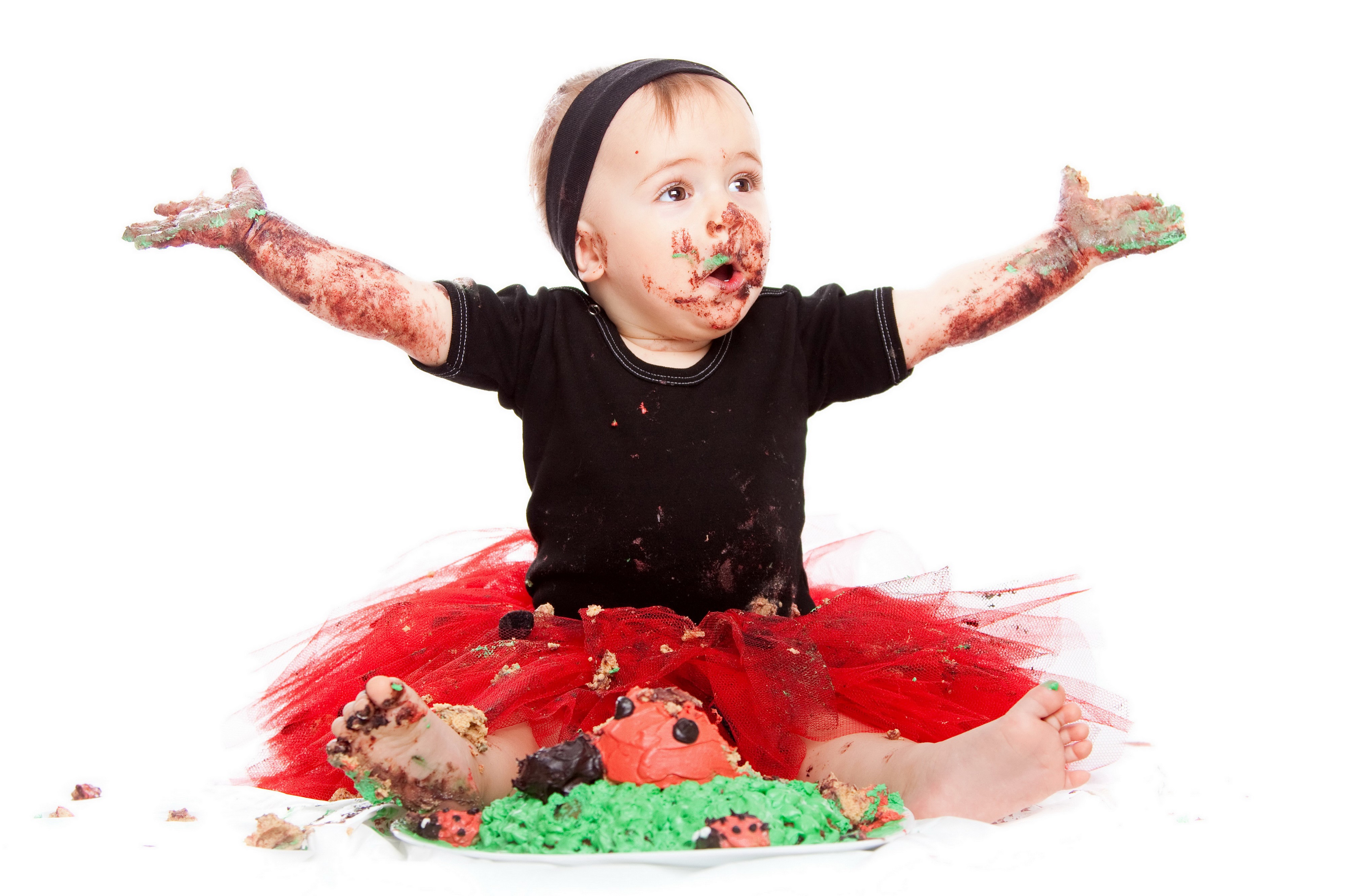 Baby girl covered in cake HD Wallpaper