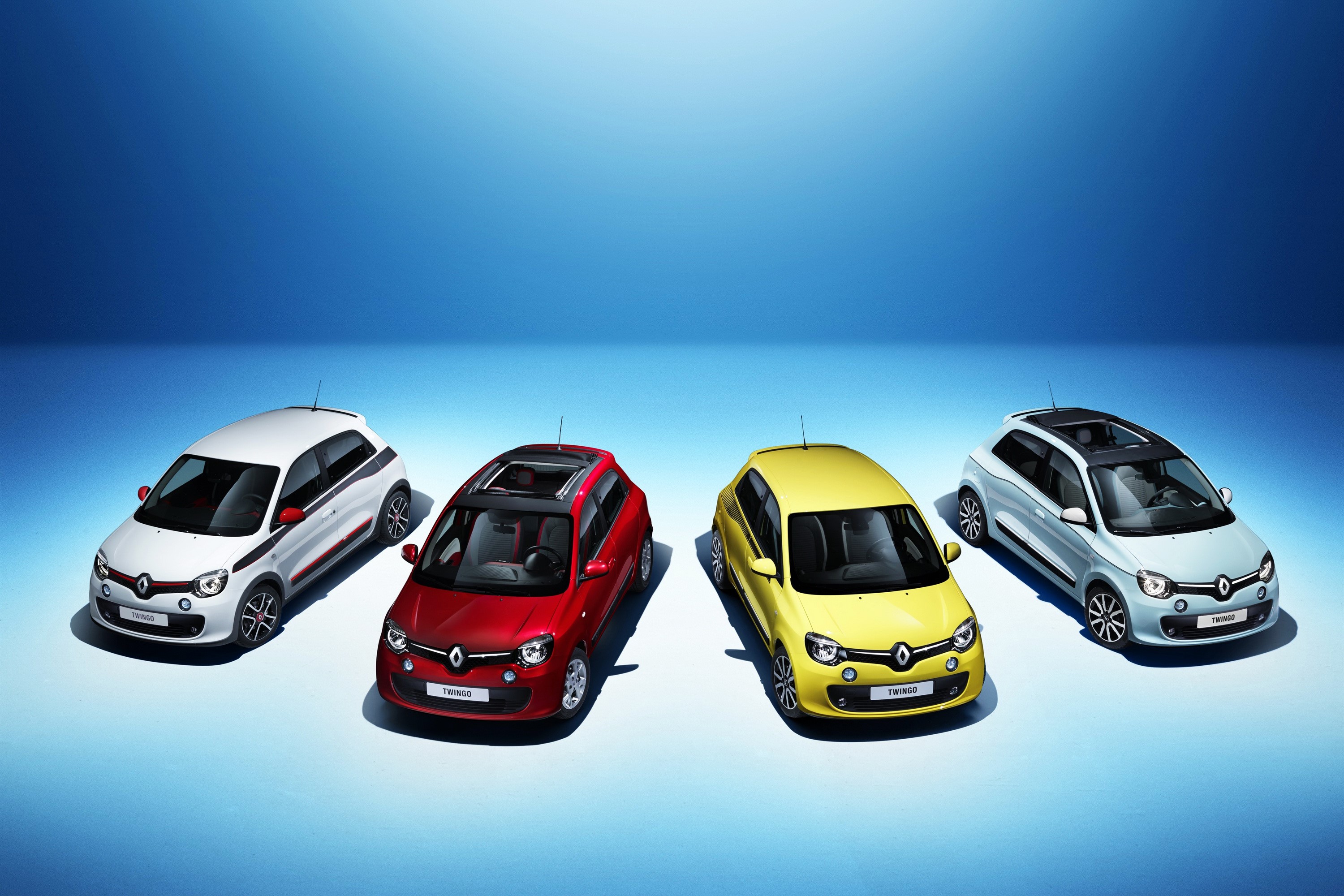 Four Renault Twingo cars in different colors HD Wallpaper
