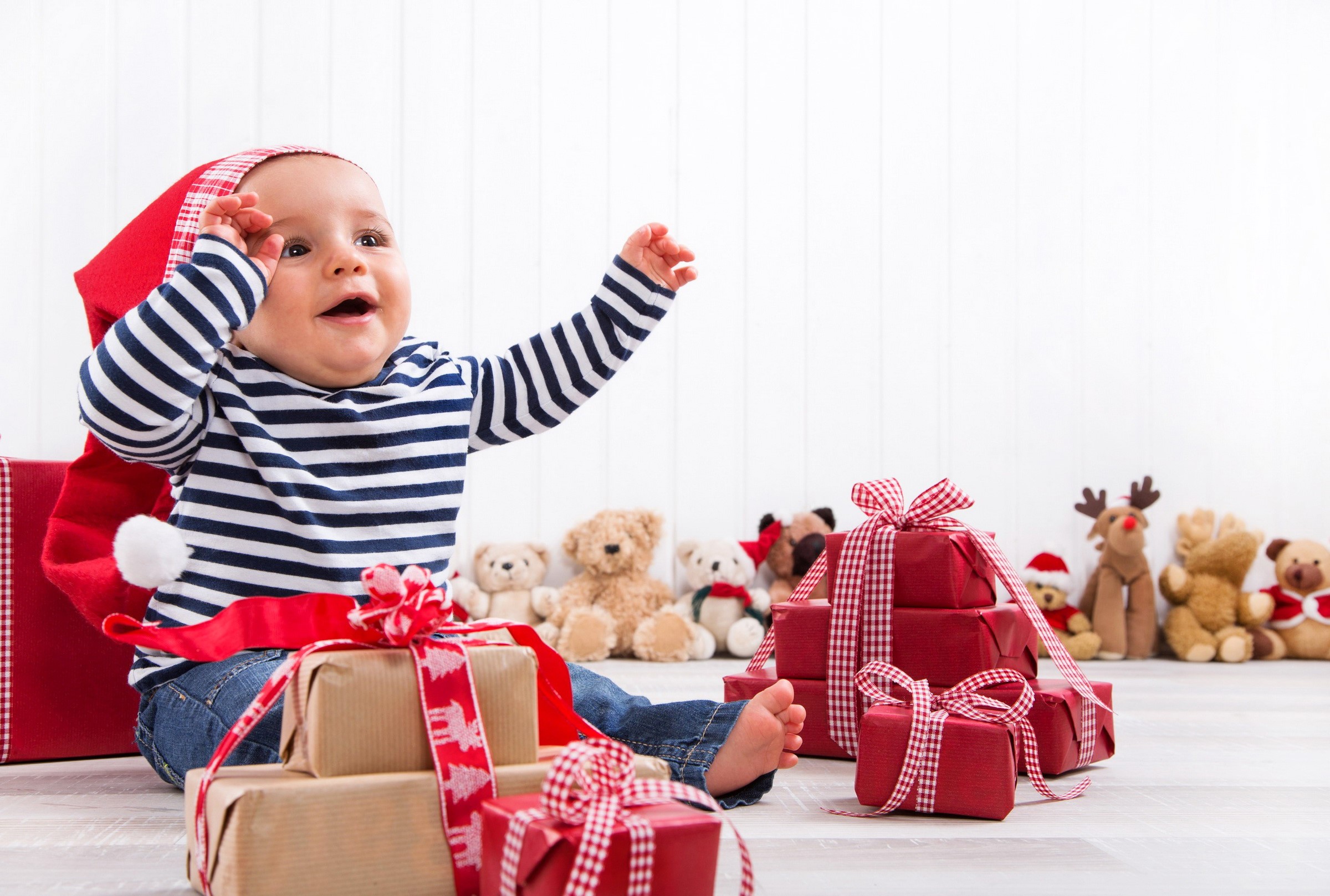 Baby in Santa hat with Christmas gifts and toys HD Wallpaper