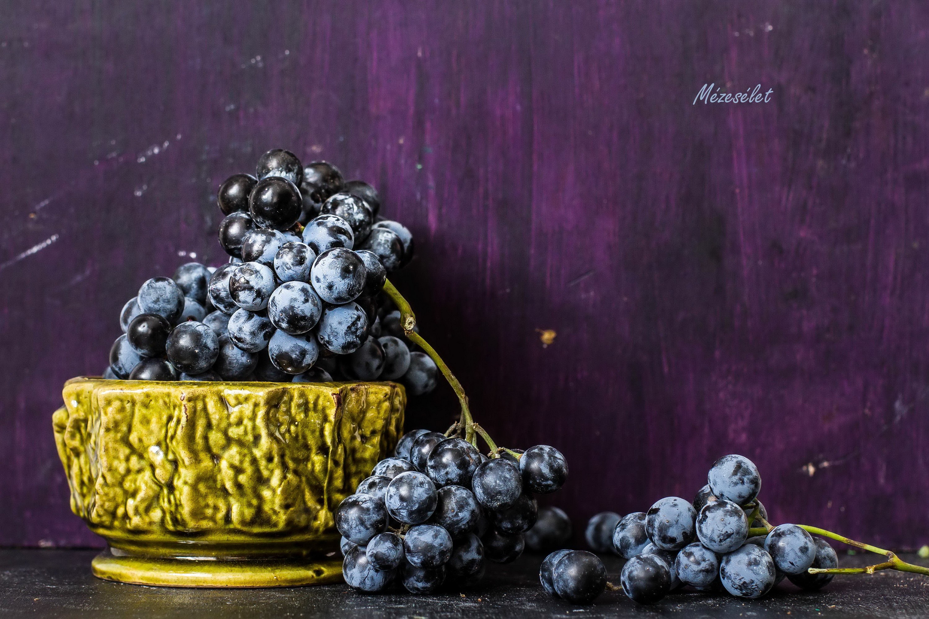 Grapes in a decorative bowl on a purple background HD Wallpaper