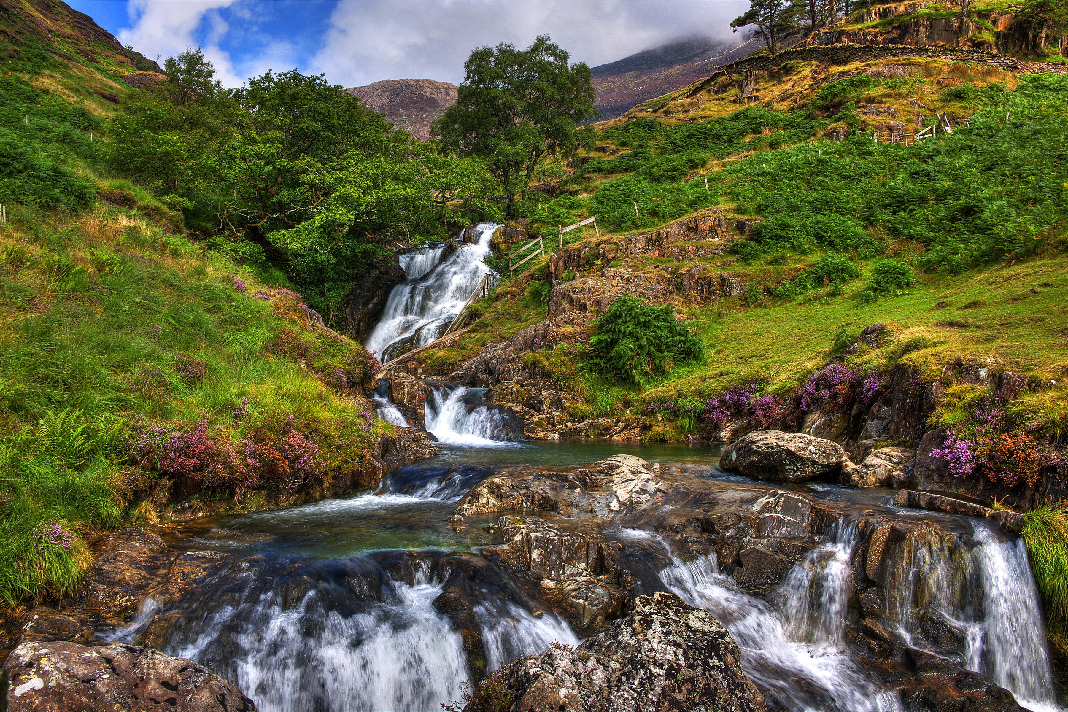 Waterfall in a green mountainous landscape in the UK HD Wallpaper