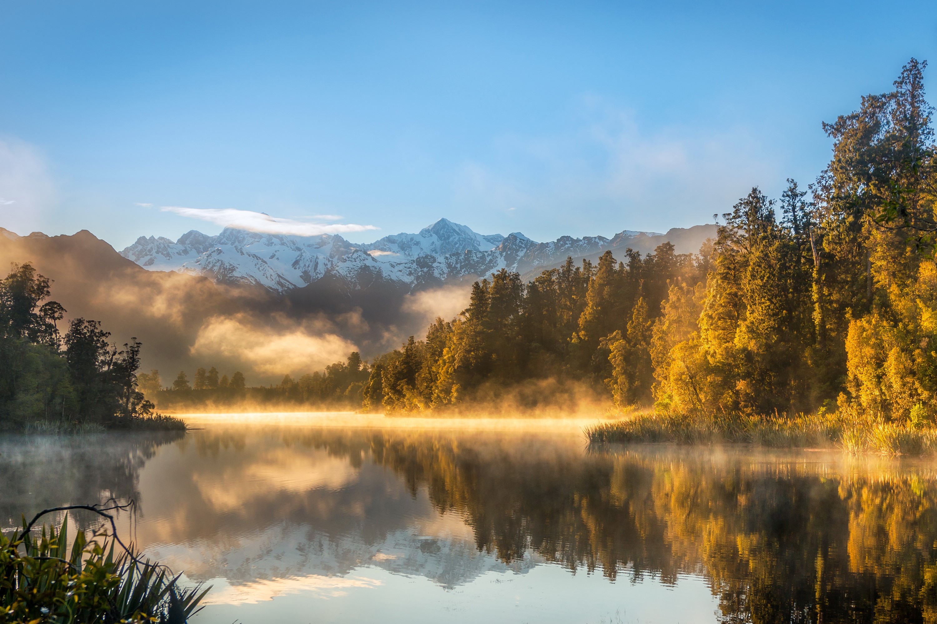 Lake Matheson with Snow-Capped Mountains and Forest in New Zealand HD Wallpaper