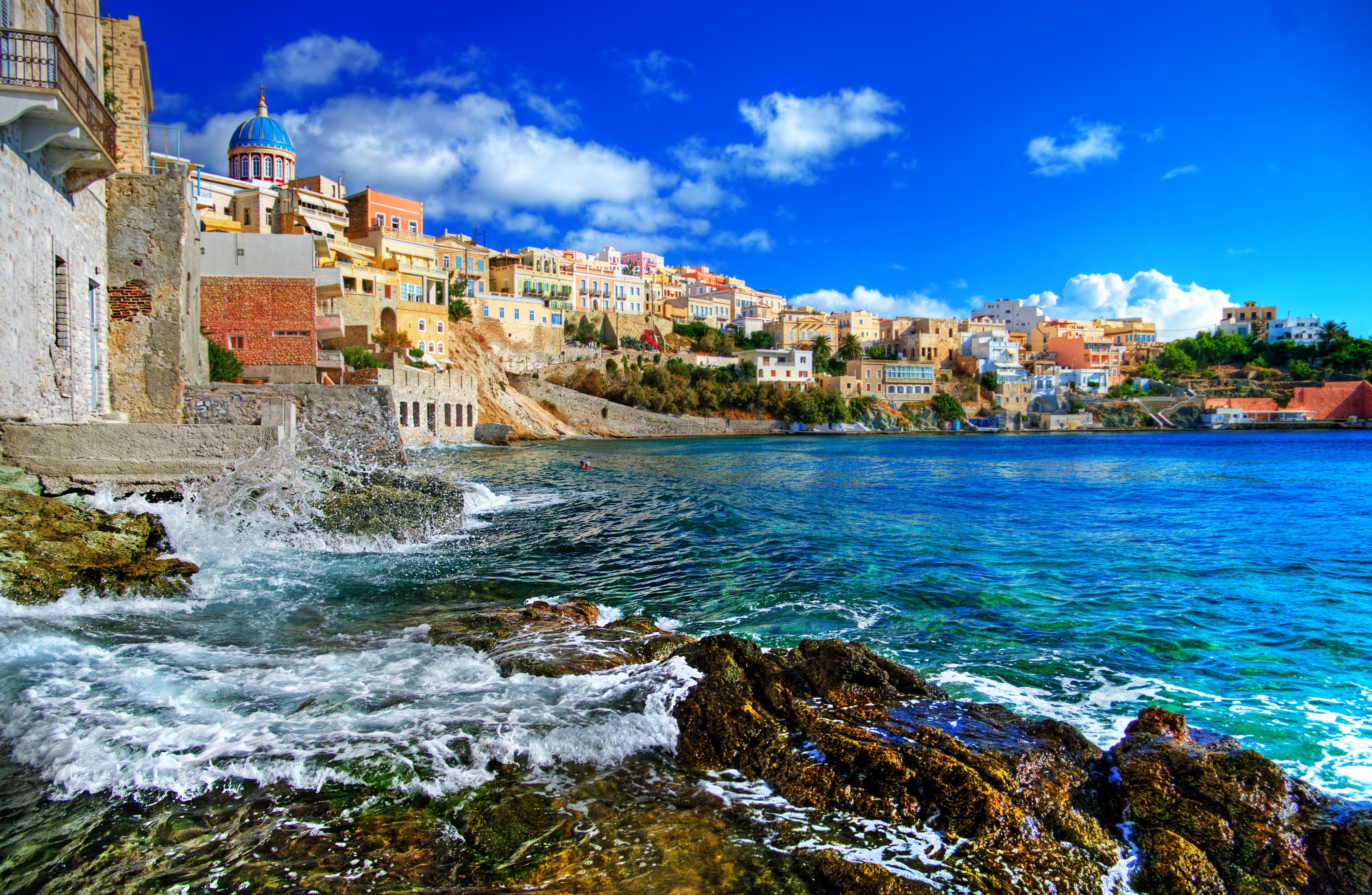 Coastal town with blue dome and sea HD Wallpaper