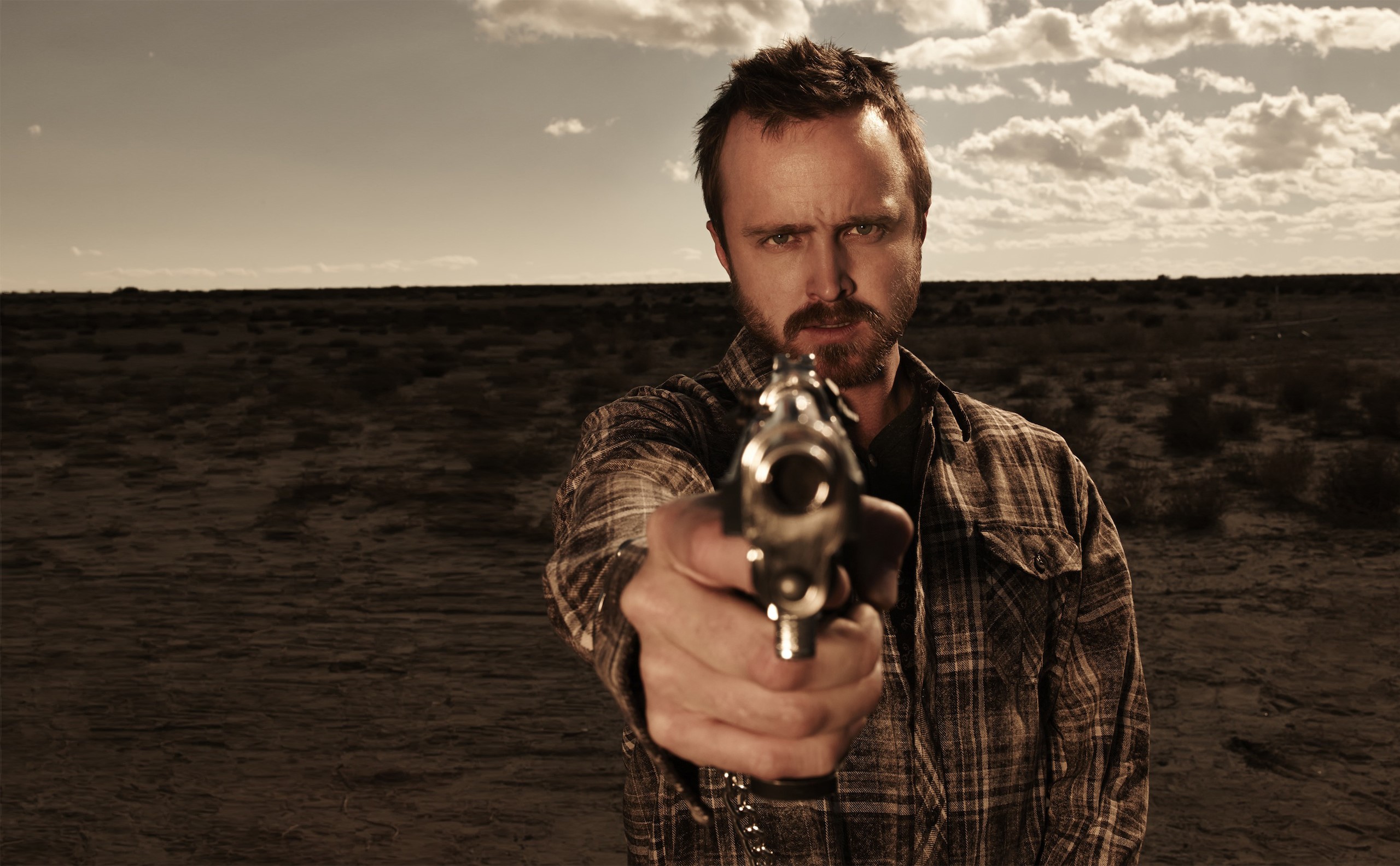 Jesse Pinkman from Breaking Bad with a pistol HD Wallpaper