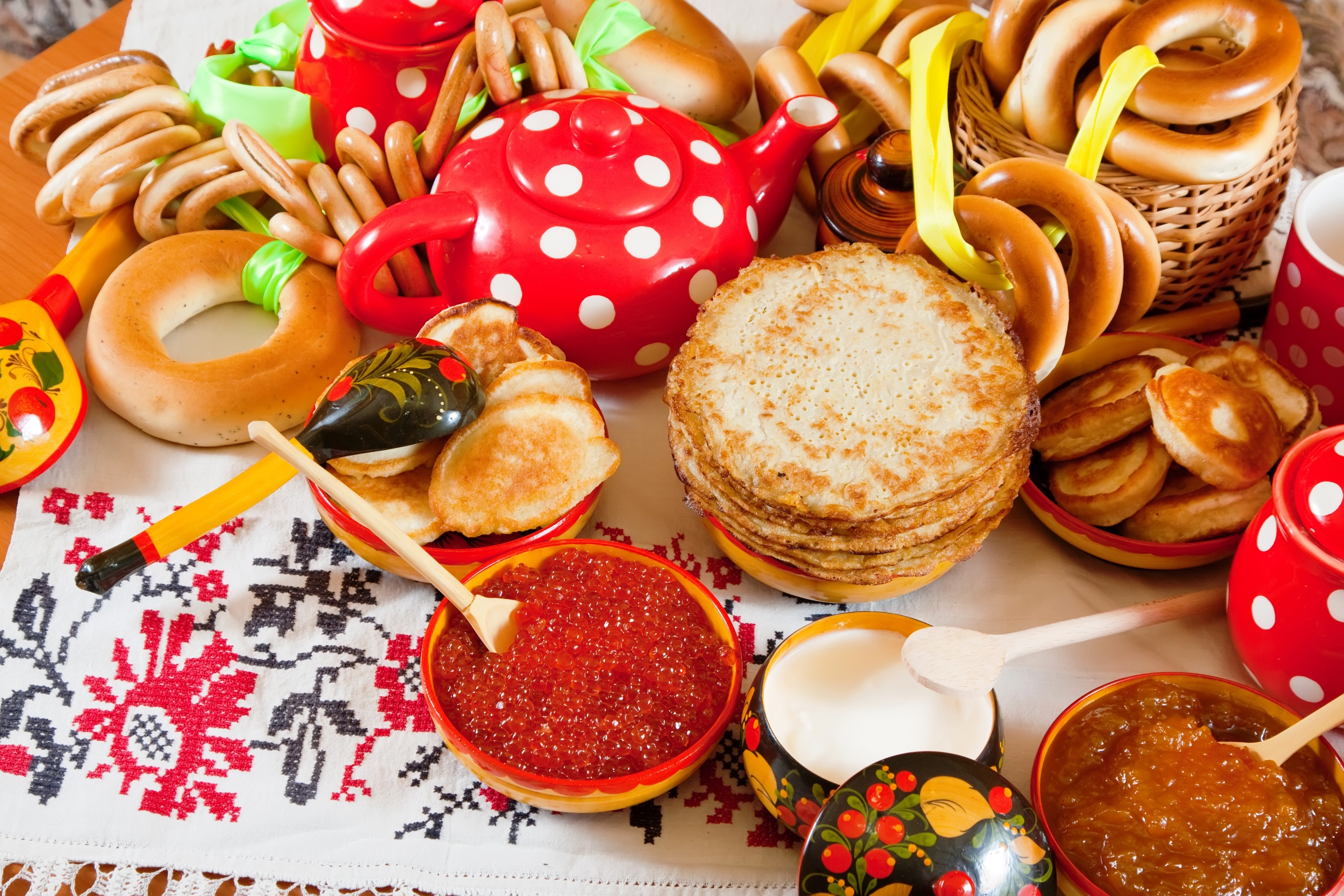 Russian Food Spread with Pancakes, Caviar, and Pastries HD Wallpaper