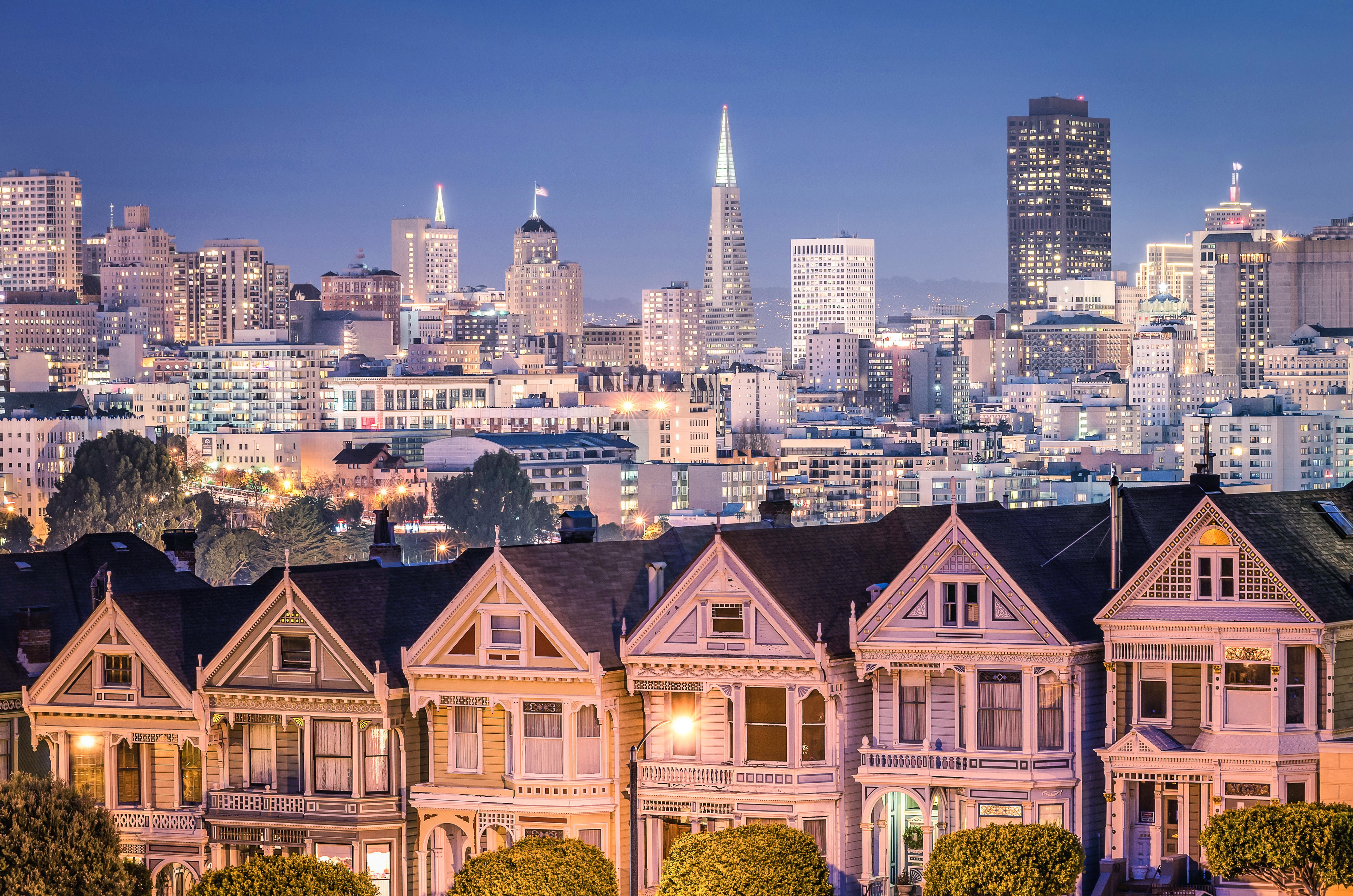 Victorian Houses and San Francisco Skyline at Night HD Wallpaper