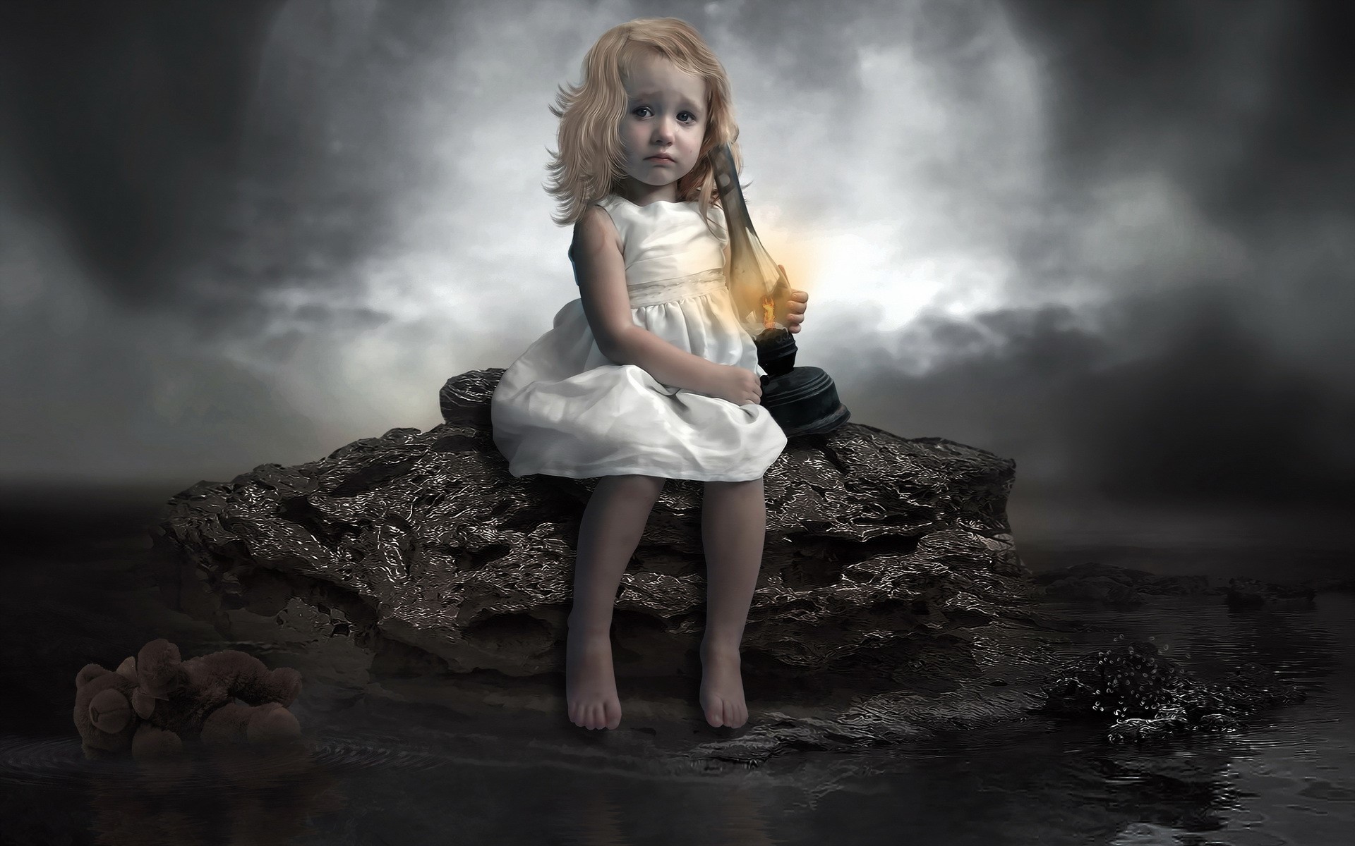 Little girl sitting on a rock holding a kerosene lamp HD Wallpaper